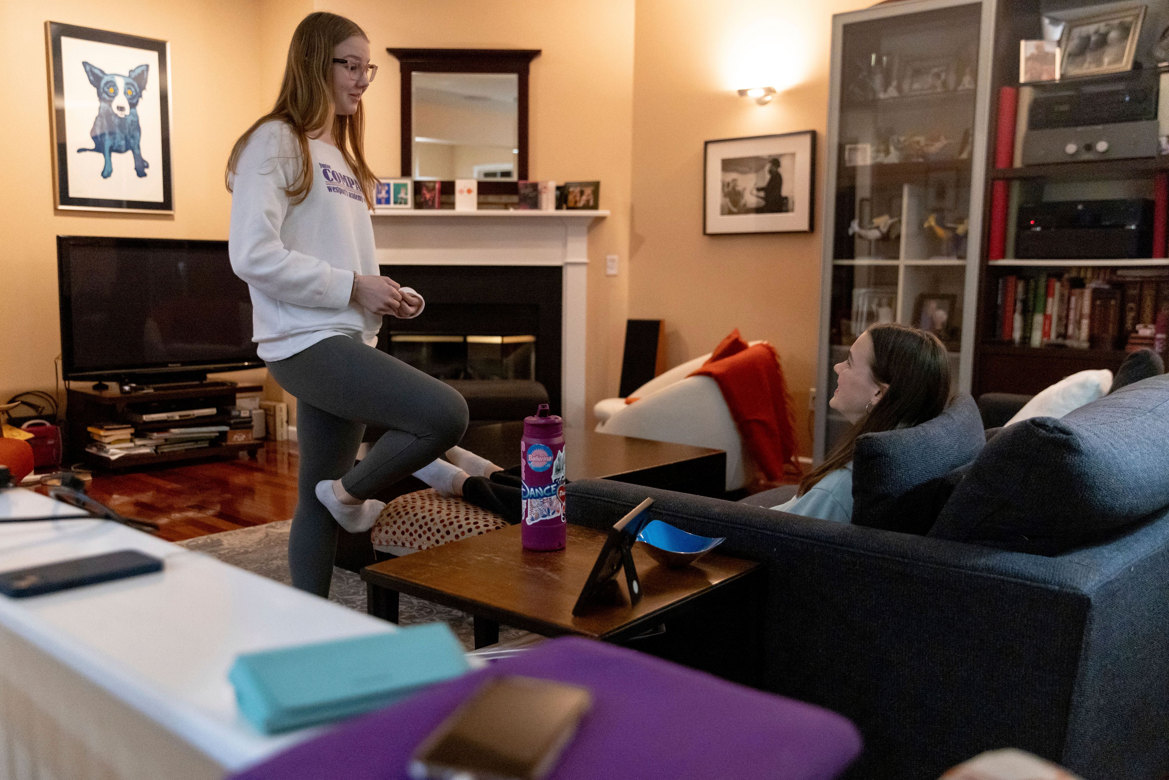 Kate and Sutton Bulkeley talk in the living room, Friday, Feb. 16, 2024, in Westport, Conn. No longer just a distraction or a way to connect with friends, social media has matured into a physical space and a community that almost all U.S. teenagers belong to. Up to 95% of teenagers say they use social media, with more than one-third saying they are on it “almost constantly,” according to the Pew Research Center.