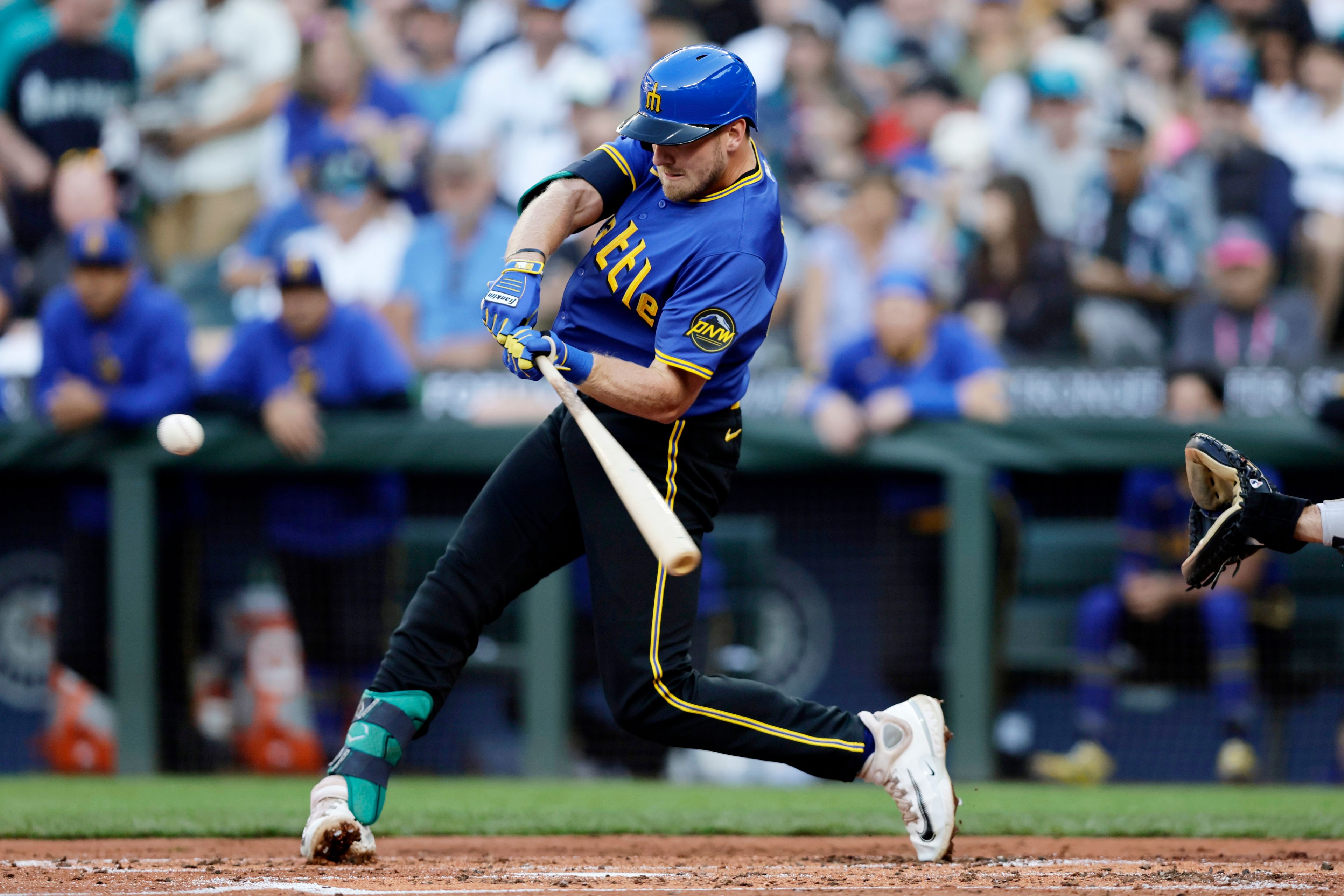 Seattle Mariners' Luke Raley hits a three-run home run off Philadelphia Phillies starting pitcher Tyler Phillips during the second inning in a baseball game, Friday, Aug. 2, 2024, in Seattle. (AP Photo/John Froschauer)