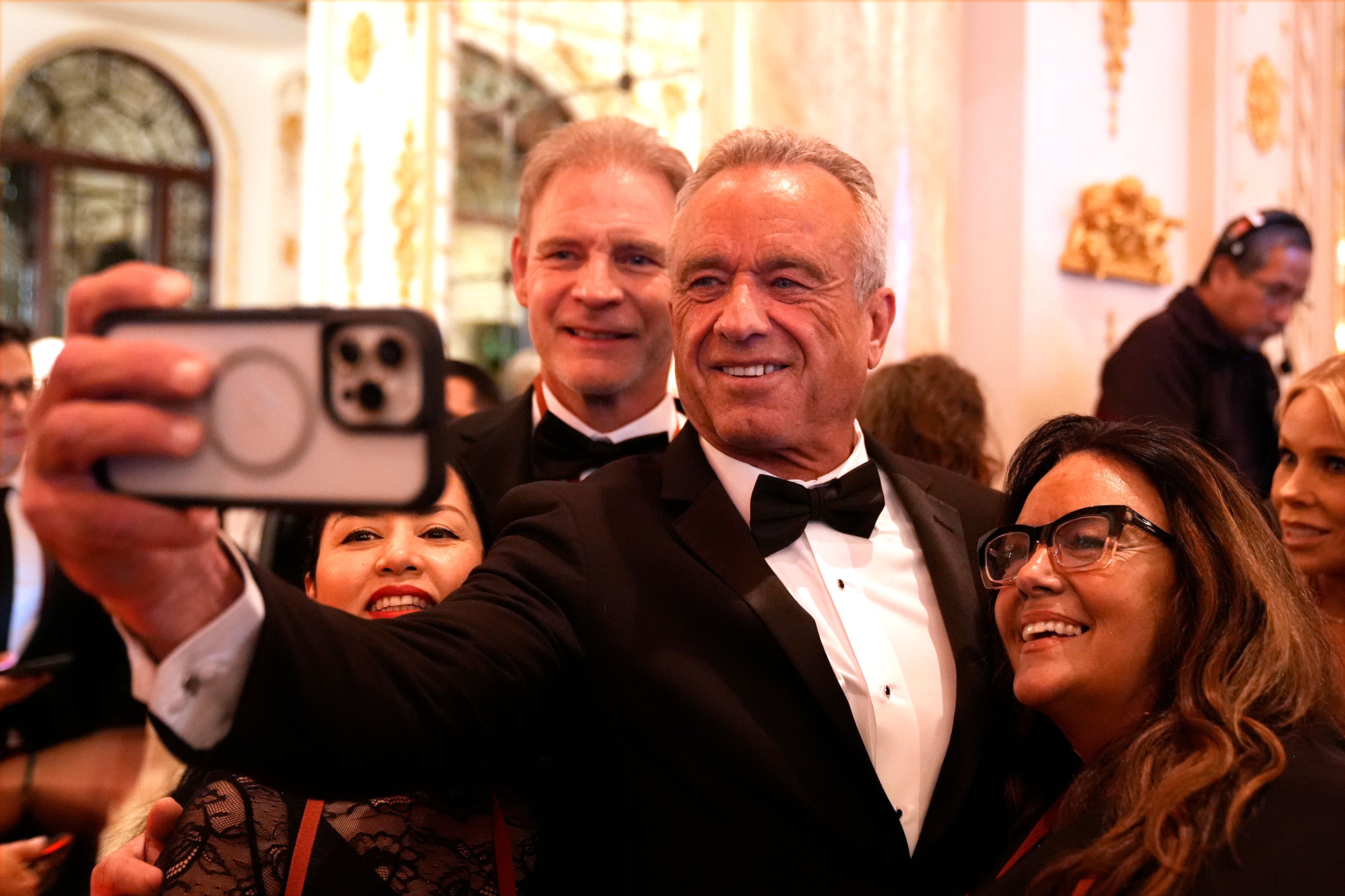 Robert F. Kennedy Jr. arrives before President-elect Donald Trump speaks during an America First Policy Institute gala at his Mar-a-Lago estate, Thursday, Nov. 14, 2024, in Palm Beach, Fla. (AP Photo/Alex Brandon)