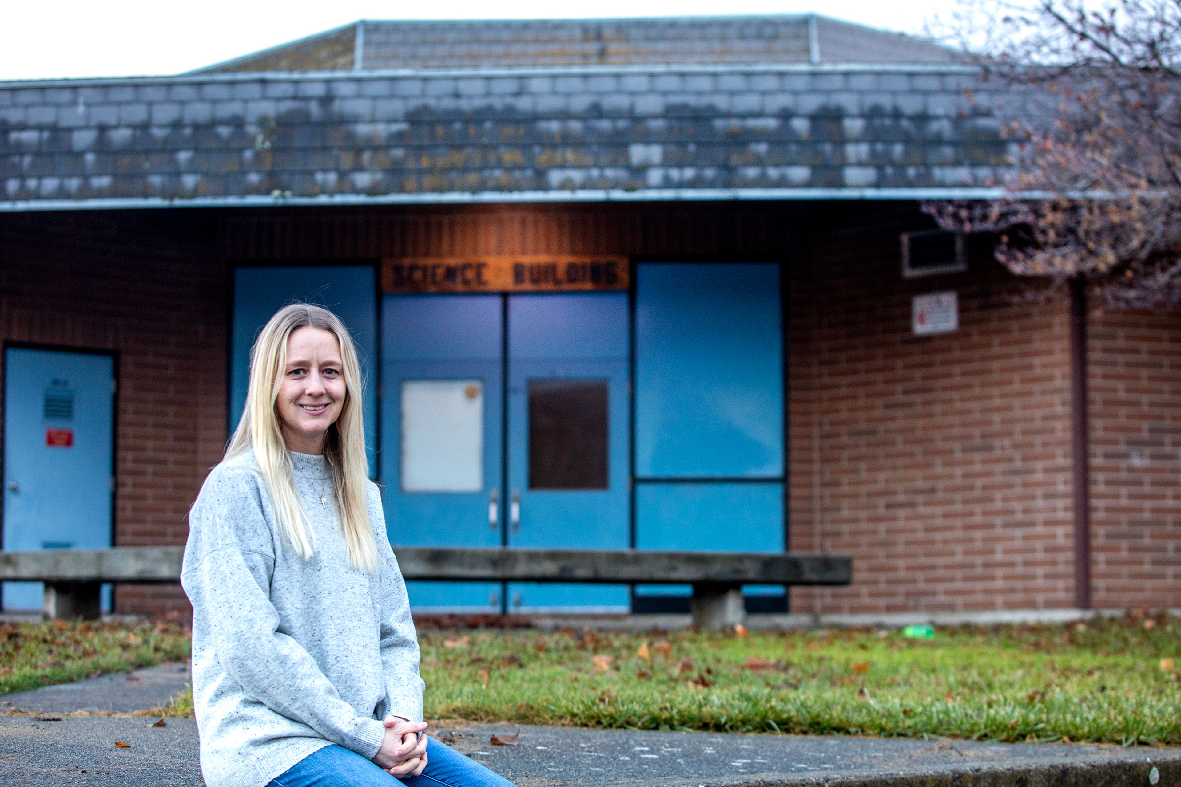 Anna Wilson stands outside the old Lewiston High School Science Building Thursday, which will be the new locations for the new Pinecrest Academy charter school.