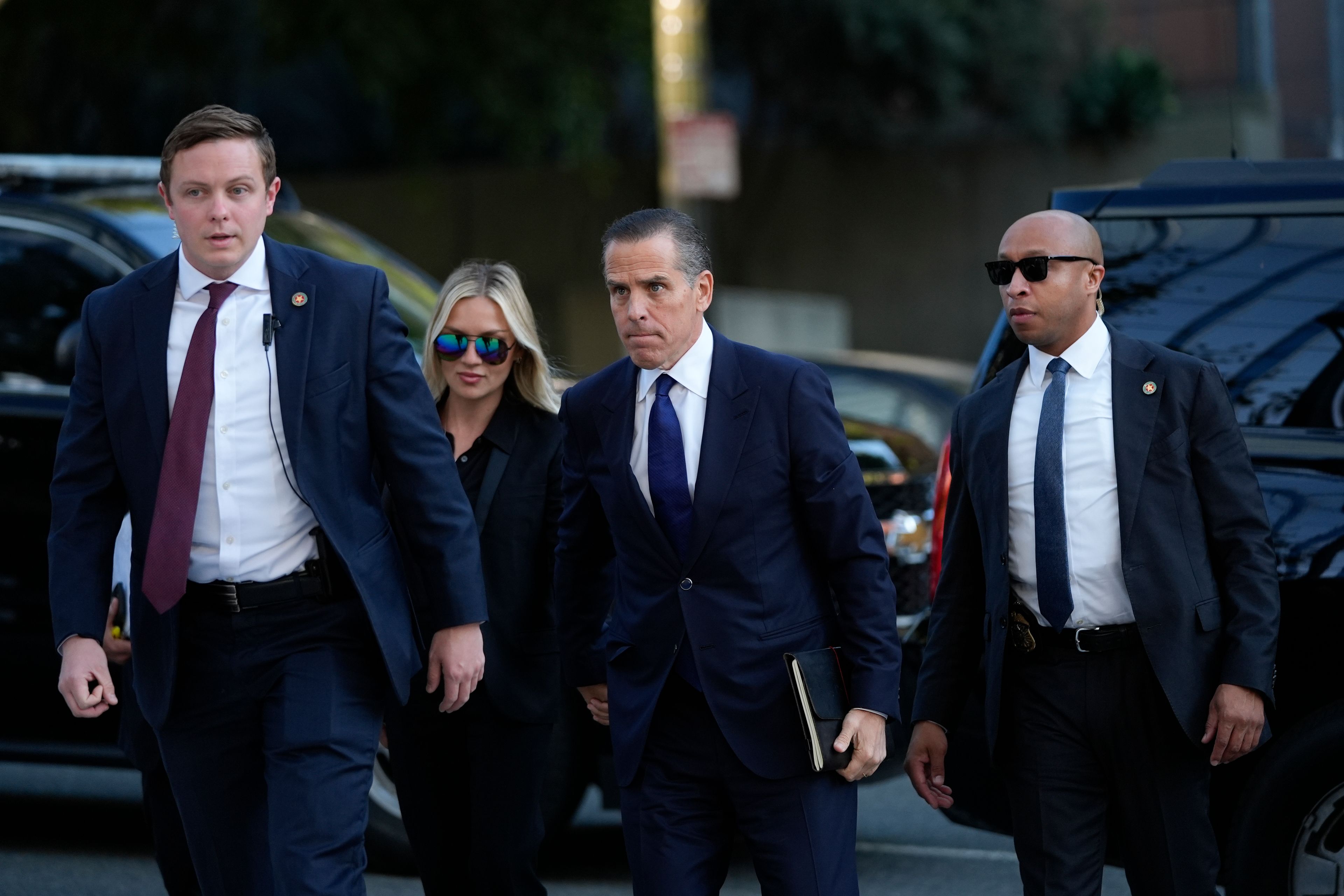 Hunter Biden, center, and his wife Melissa Cohen Biden, arrive in federal court for jury selection for his trial on felony tax charges Thursday, Sept. 5, 2024, in Los Angeles. (AP Photo/Jae C. Hong)