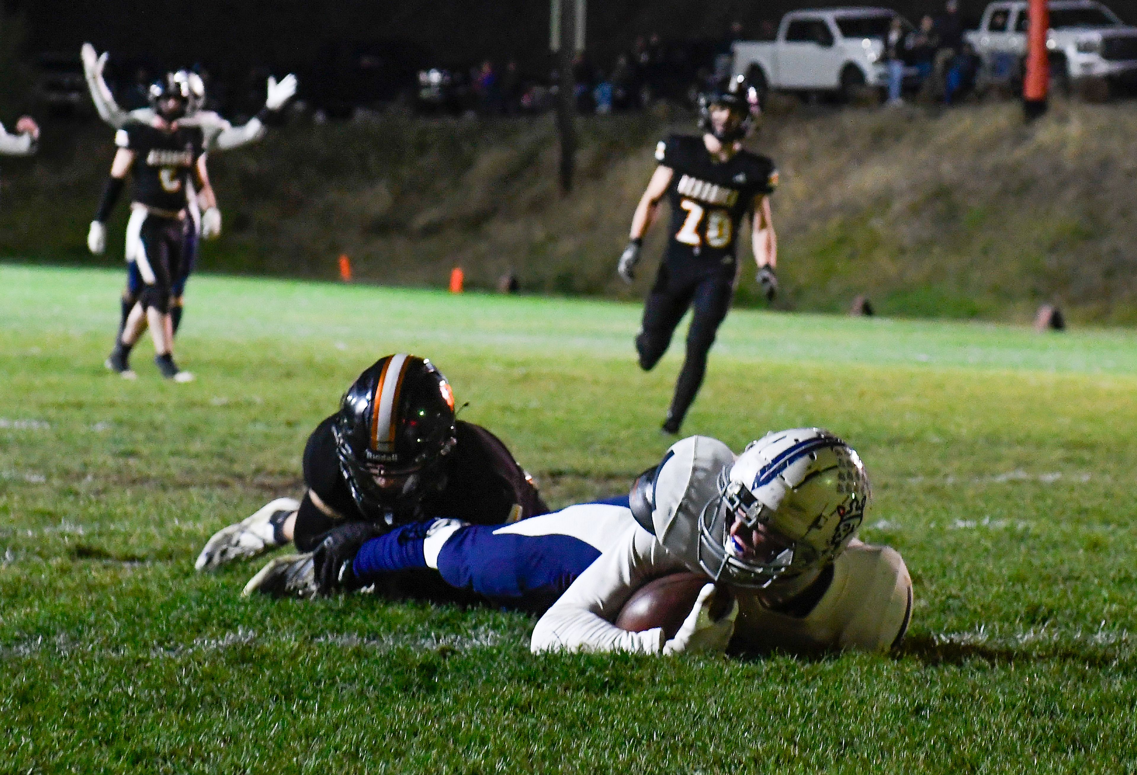 Logos wide receiver Lucius Comis lands in just inside the end zone for a touchdown Friday in Kendrick.,