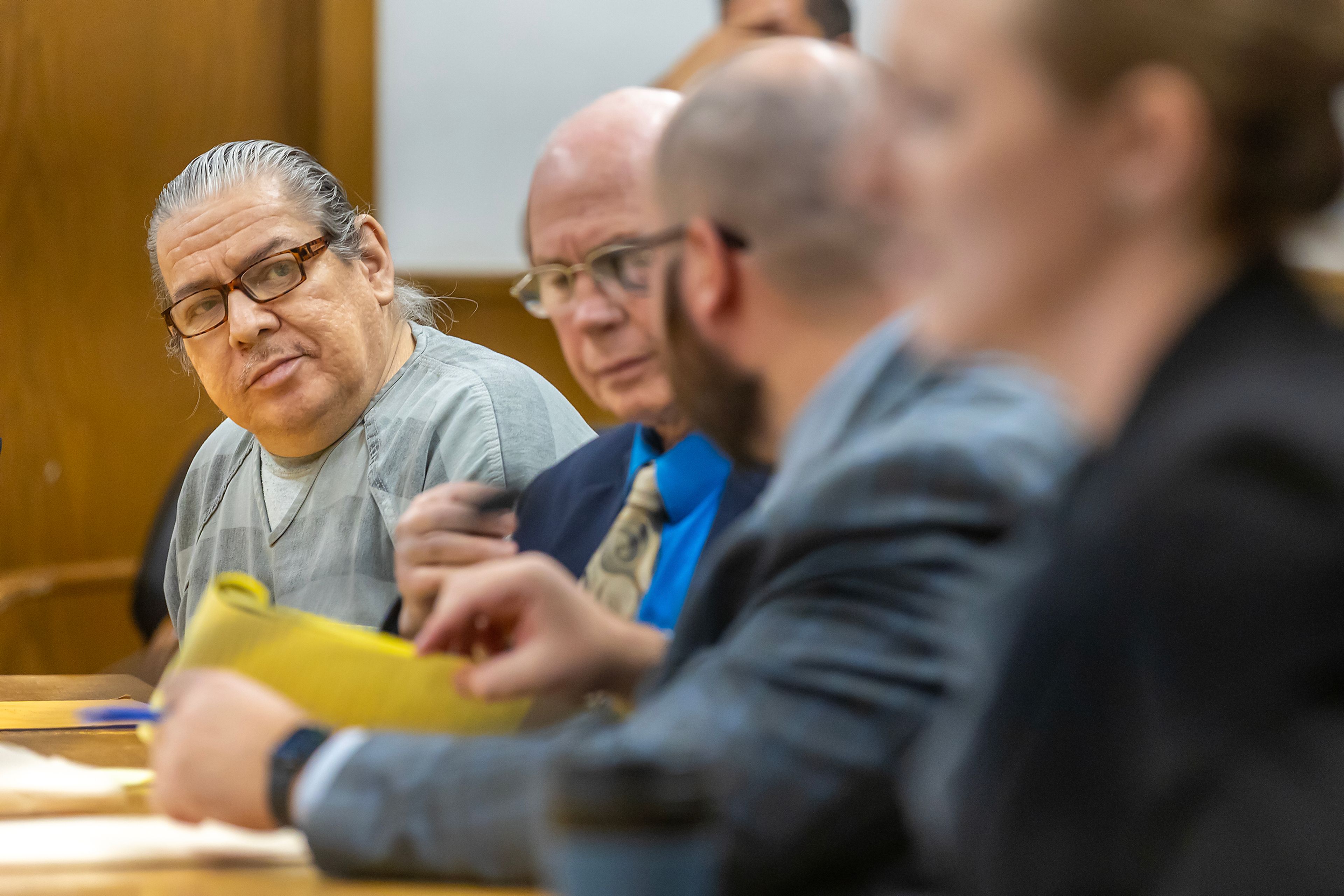 Brian Grimm looks across the table as the prosecution speaks during his sentencing Monday at the Nez Perce County Courthouse in Lewiston. Grimm was sentenced to the maximum of 15 years for attempted first-degree murder.