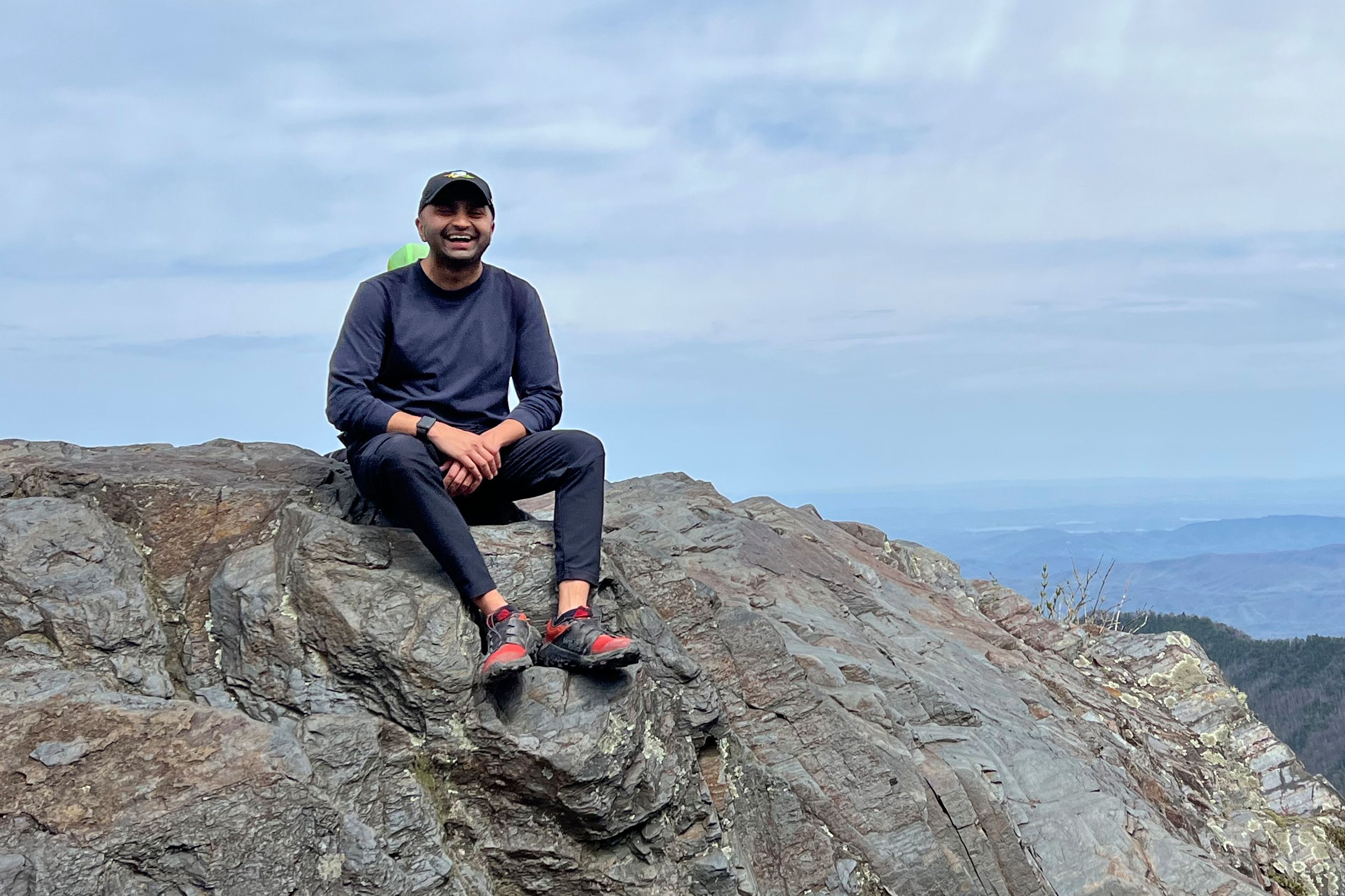 Prince Bhojwani sits on Charlies Bunion mountain along the Appalachian Trail in Great Smoky Mountains National Park in Tennessee on April 17, 2022.