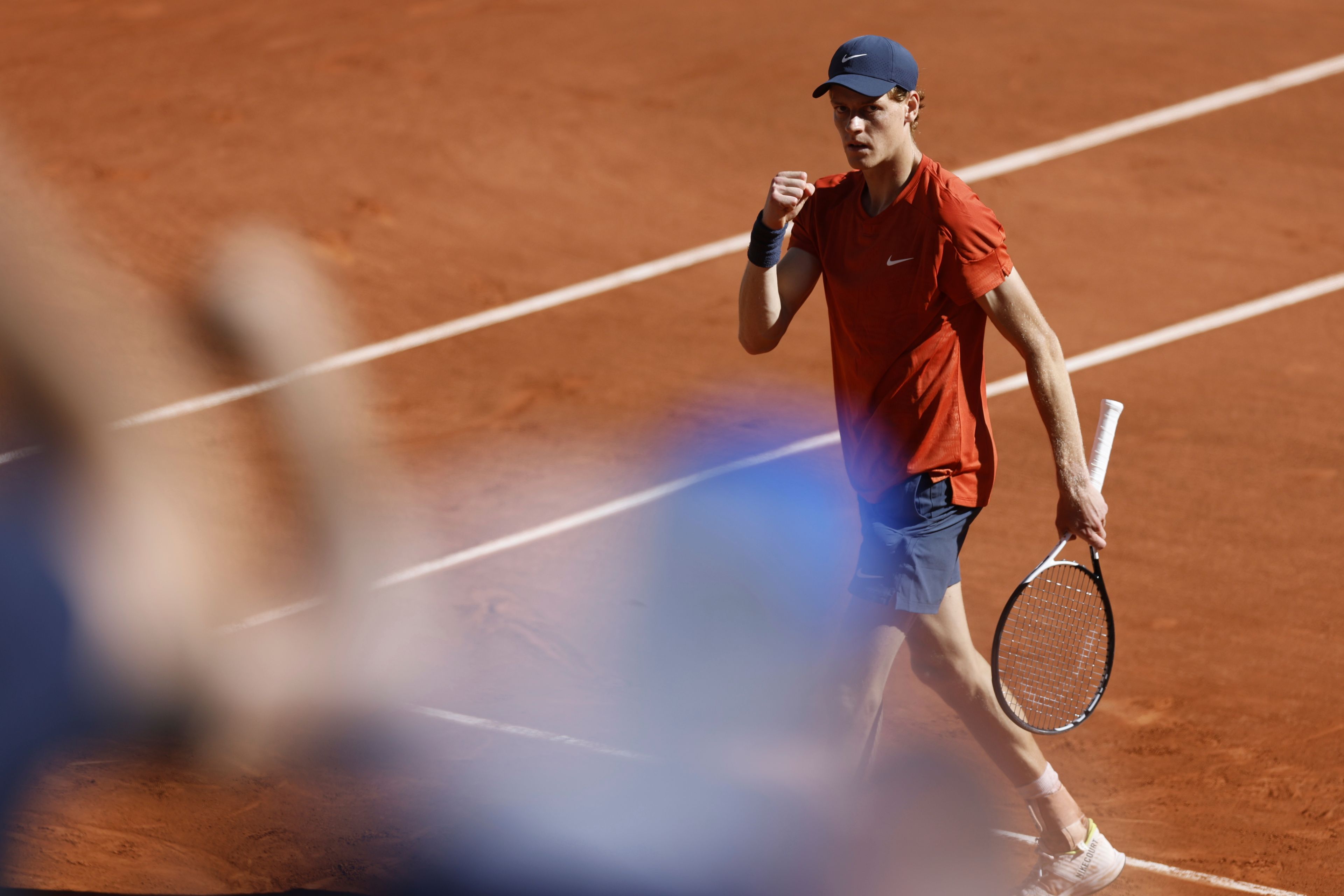 Italy's Jannik Sinner reacts during his semifinal match of the French Open tennis tournament against Spain's Carlos Alcaraz at the Roland Garros stadium in Paris, Friday, June 7, 2024.