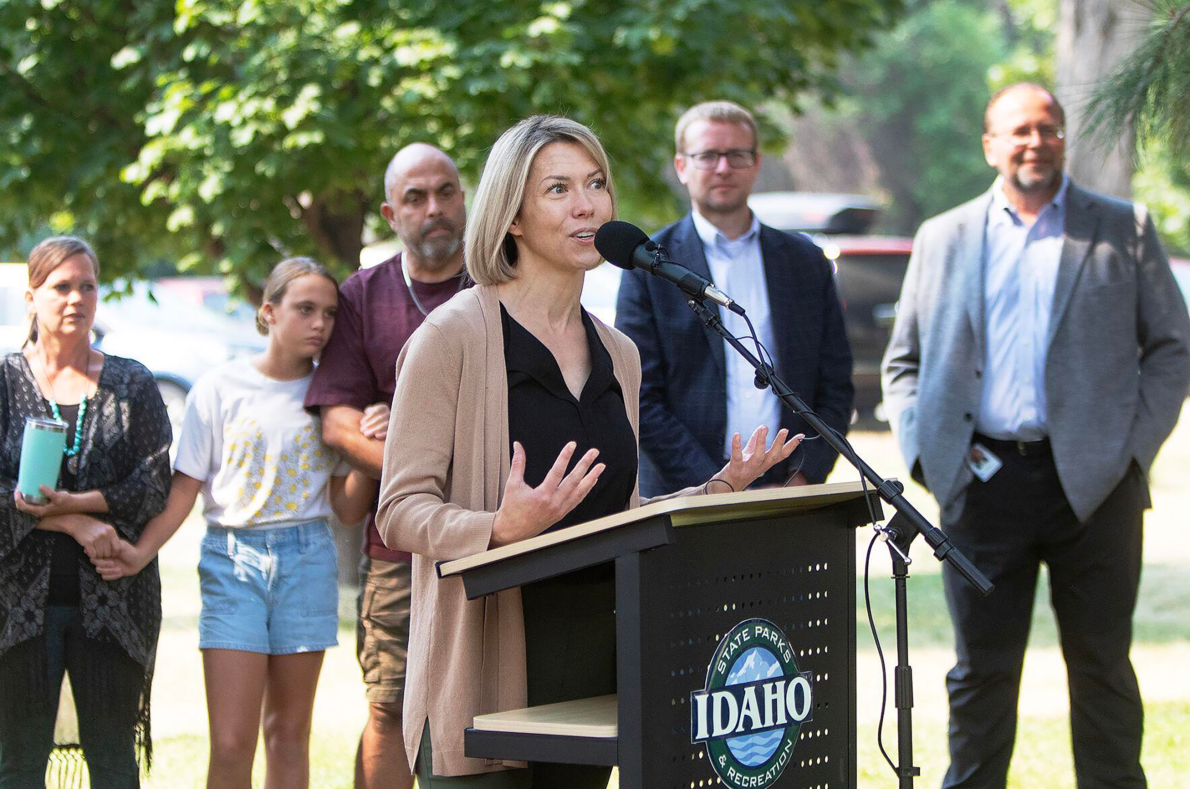 Idaho Business for the Outdoors Executive Director Heather Eastman speaks during an event Wednesday announcing the creation of the Idaho State Park Foster Family Passport program.