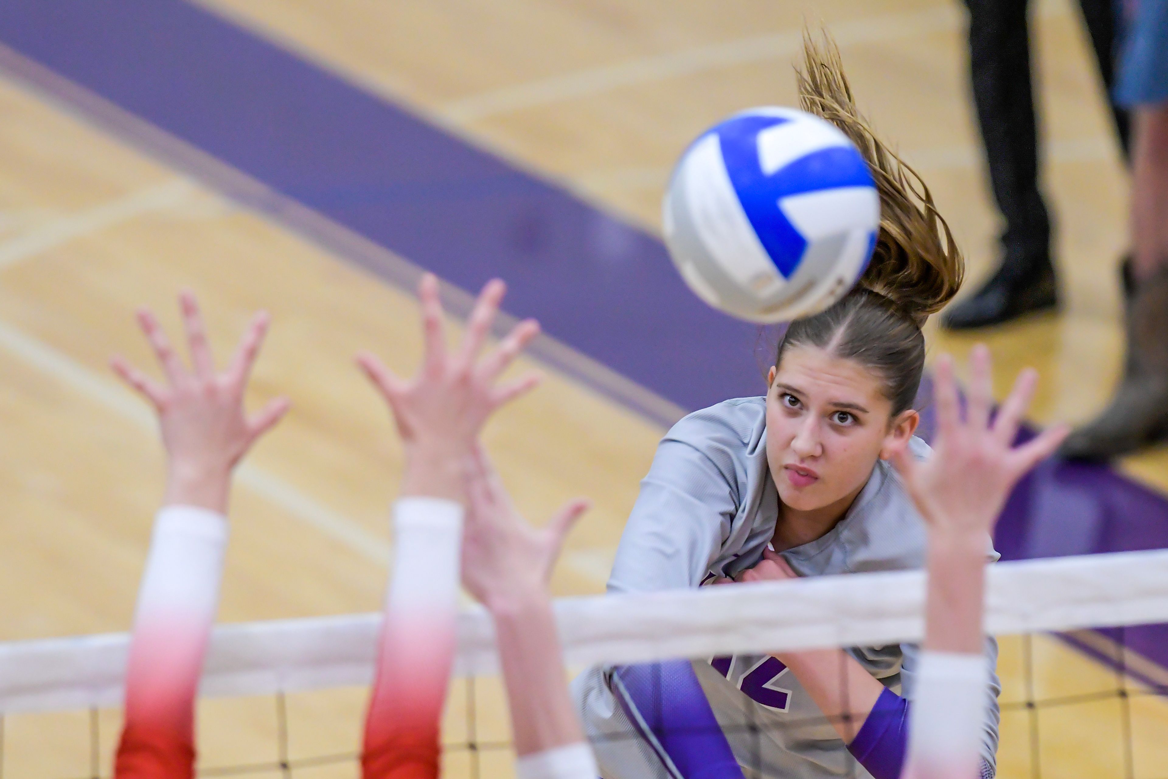 Lewiston outside hitter Addy McKarcher spikes the ball against Sandpoint during a volleyball game Thursday in Lewiston.,