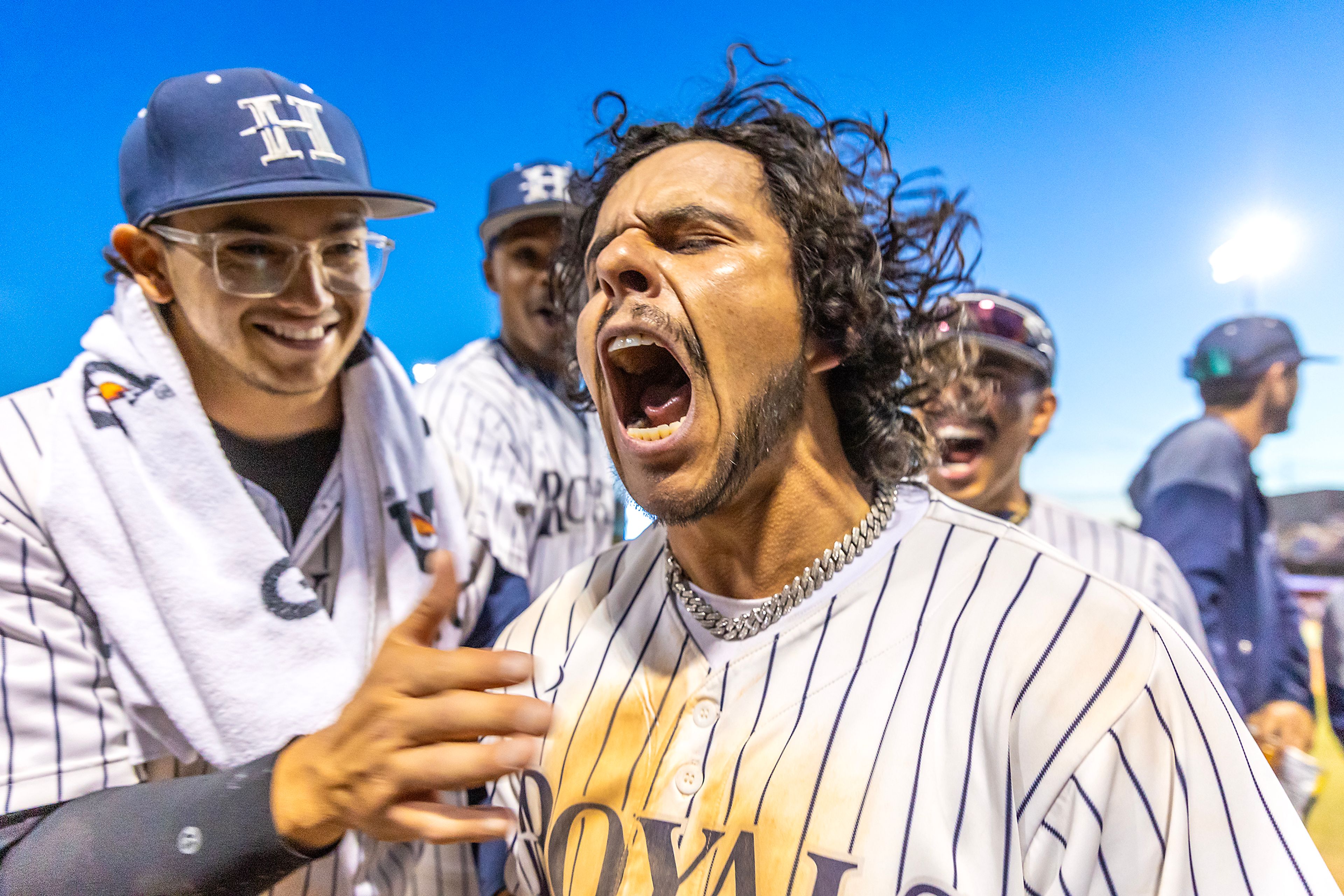 Hope International’s David Rivera lets out a yell after scoring a home run against Tennessee Wesleyan in Game 19 of the NAIA World Series at Harris Field Friday in Lewiston.