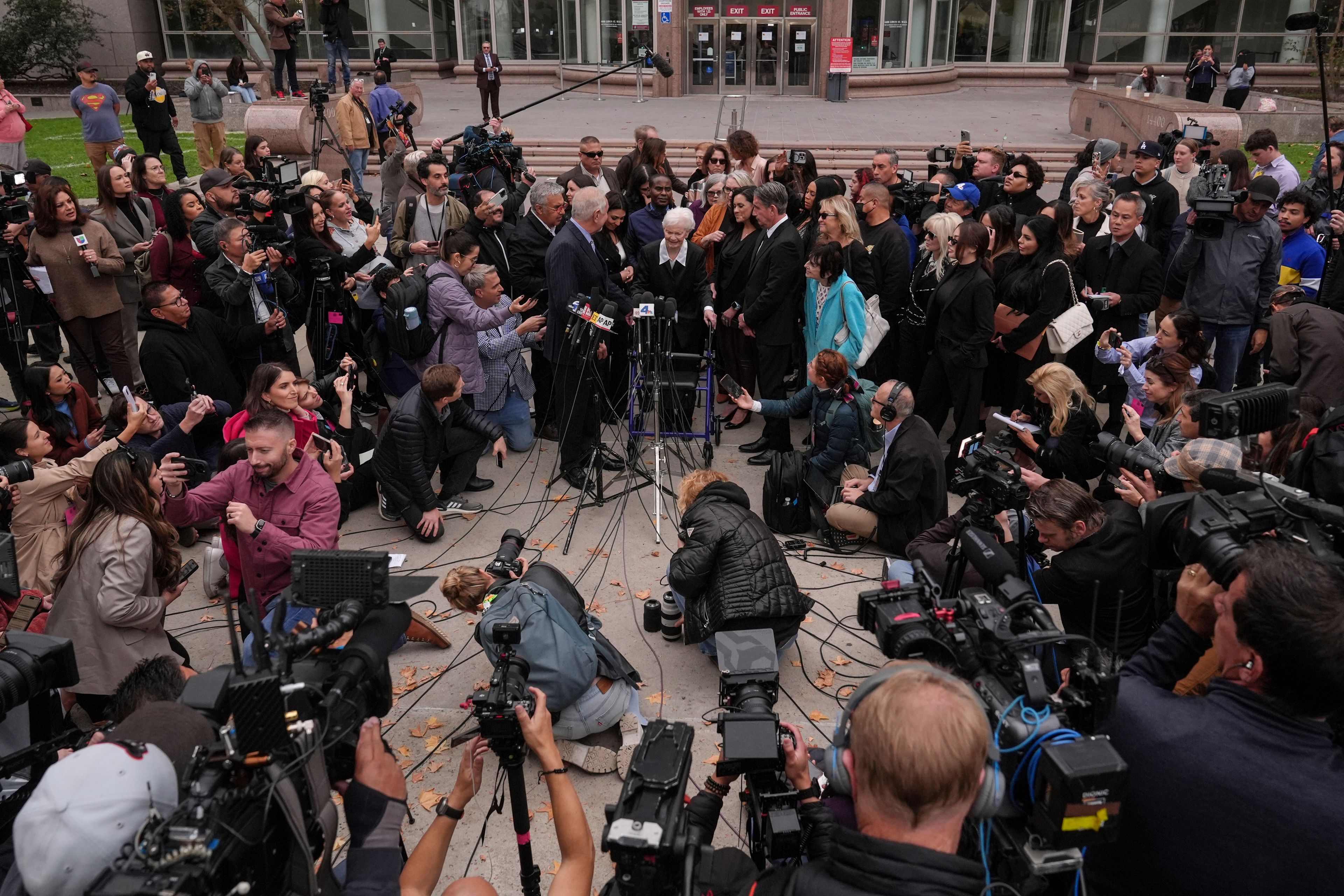 Family members of Erik and Lyle Menendez and their attorneys attend a news conference after a hearing in Los Angeles, Monday, Nov. 25, 2024. (AP Photo/Jae C. Hong)