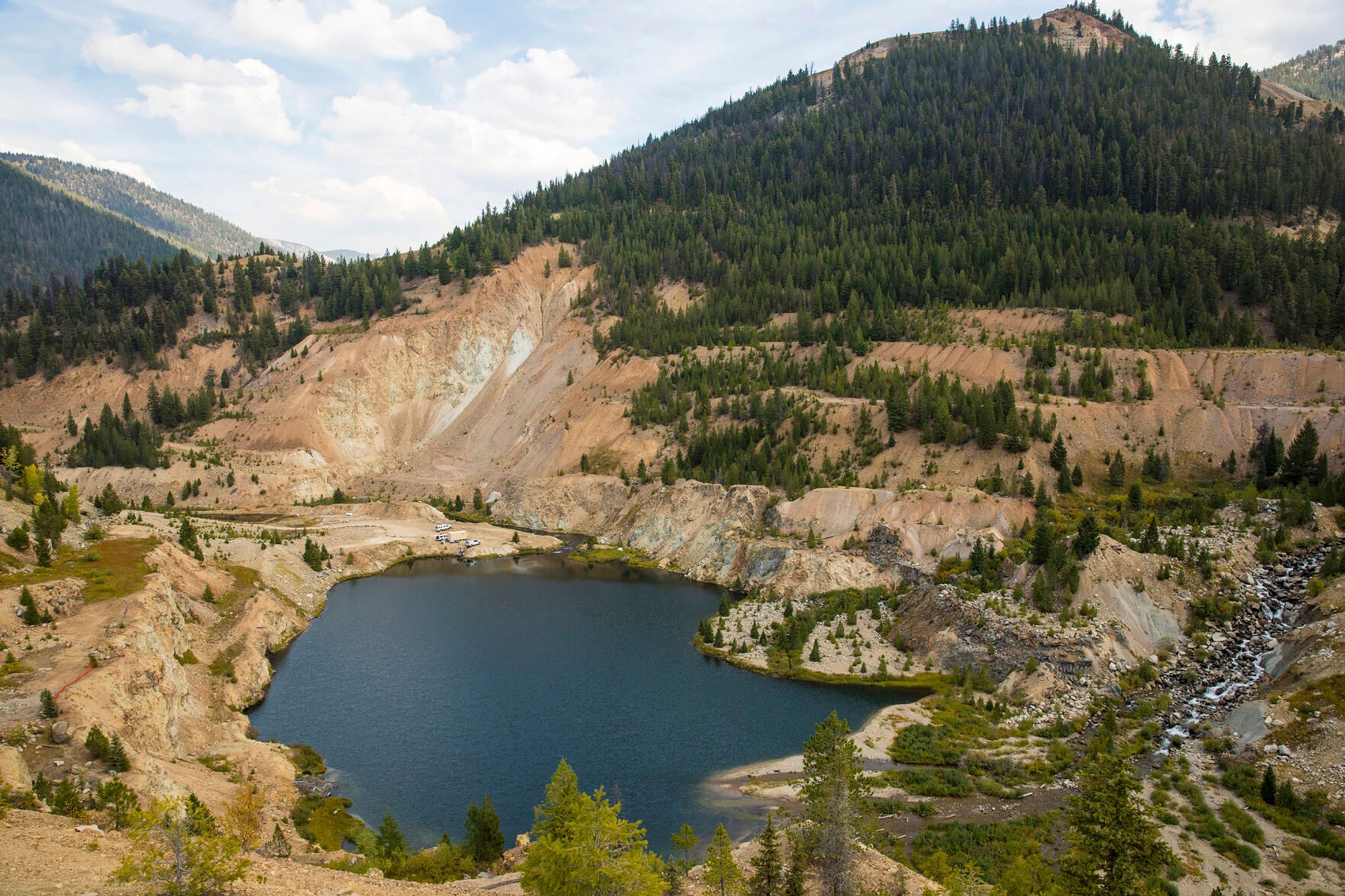 FILE - The Yellow Pine Pit open-pit gold mine in the Stibnite Mining District in central Idaho.