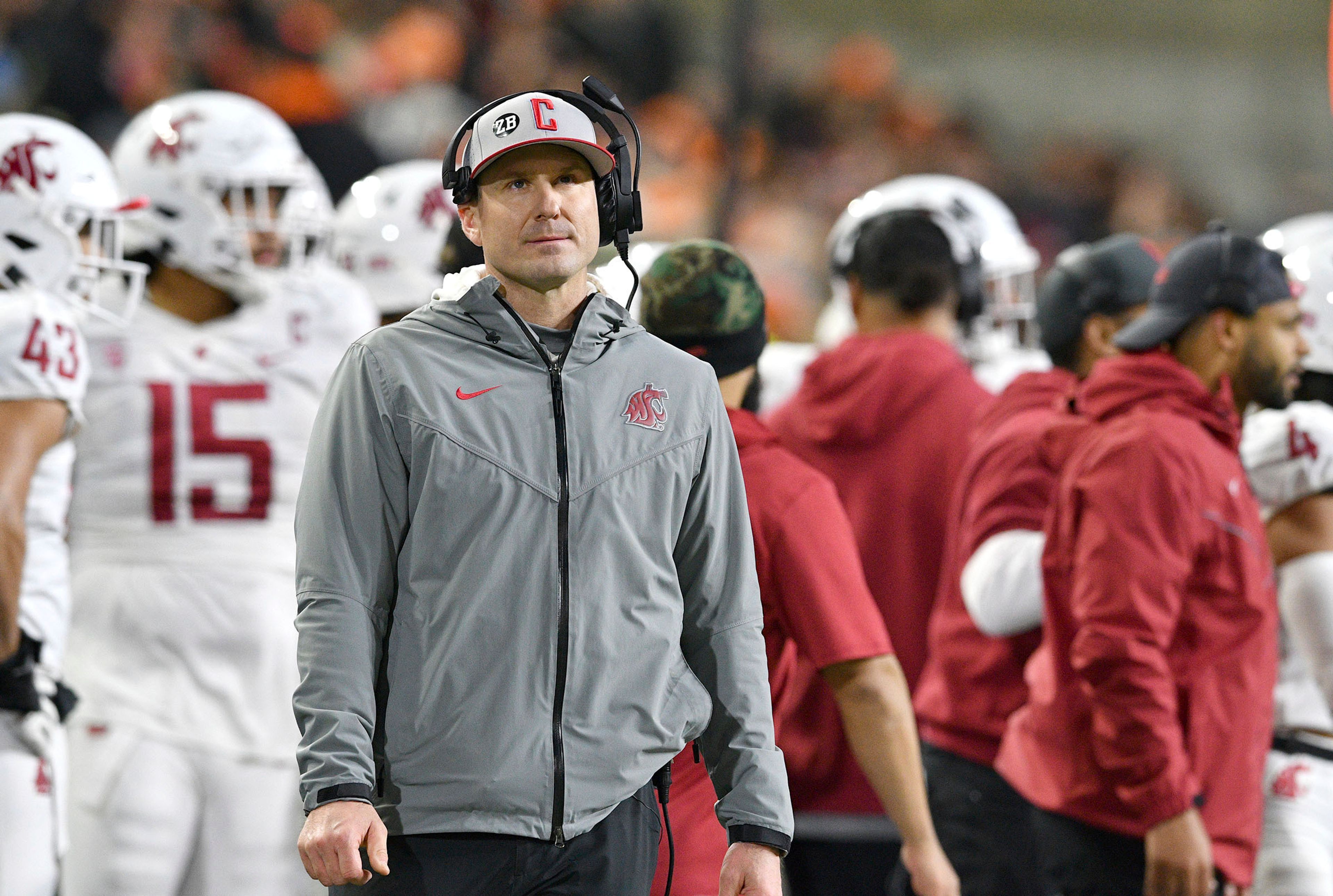 Washington State head coach Jake Dickert checks out the video screen while playing Oregon State during the first half of an NCAA college football game Saturday, Nov. 23, 2024, in Corvallis, Ore. Oregon State won 41-38. (AP Photo/Mark Ylen)