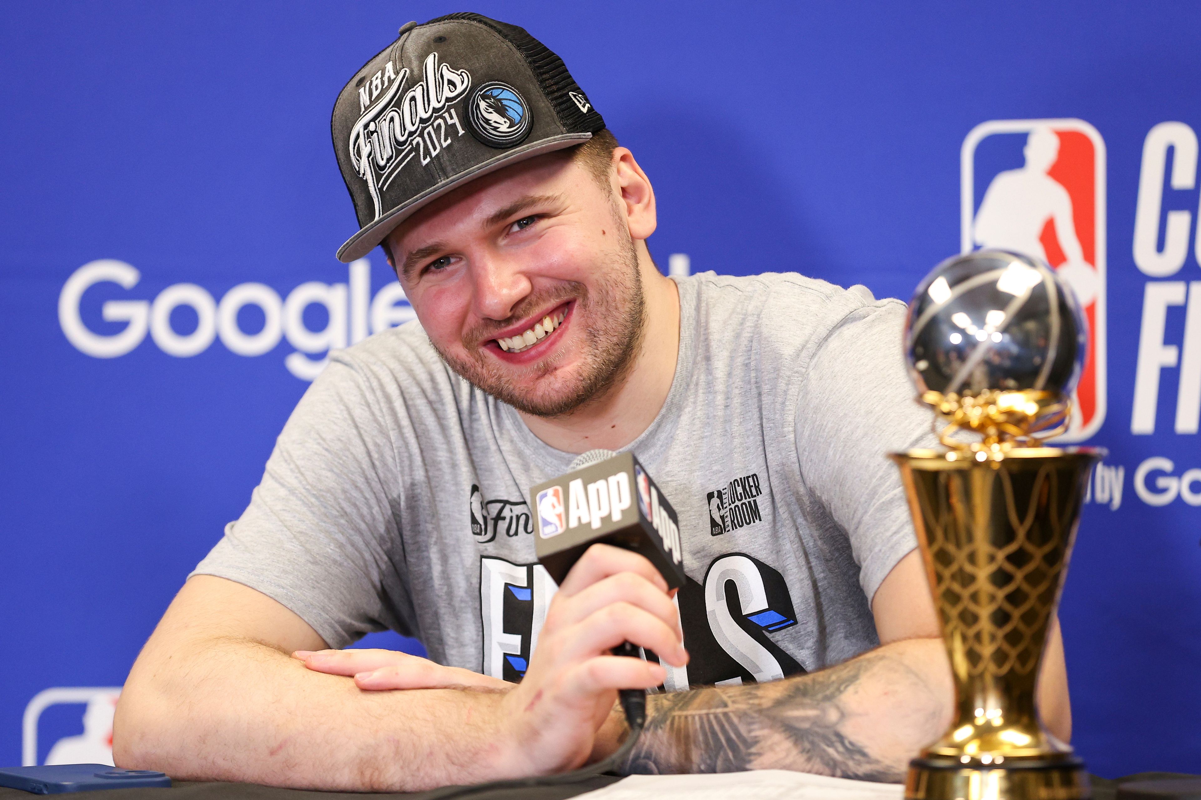 Mavericks guard Luka Doncic smiles during a news conference after the team's win over the Timberwolves in Game 5 of the NBA Western Conference finals Thursday in Minneapolis.