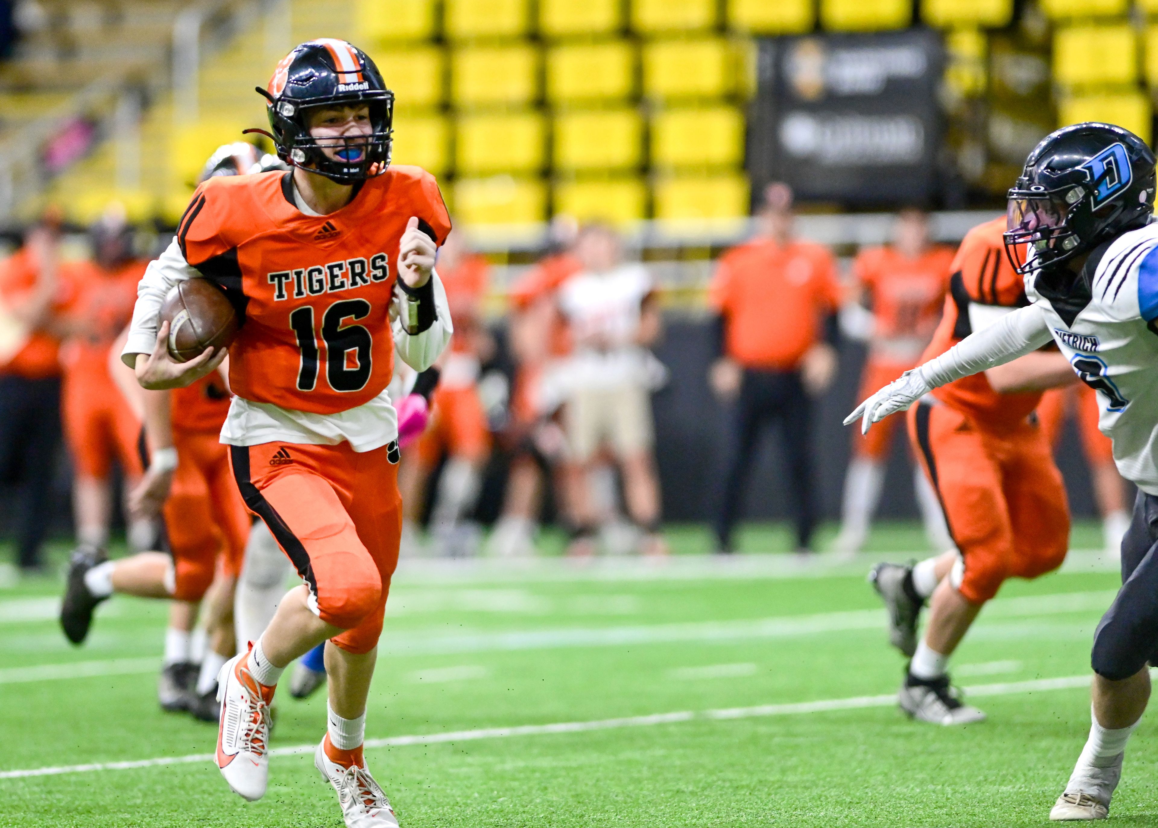 Kendrick freshman quarterback Maddox Kirkland (16) carries the ball down the field as Dietrich defenders close in during a game last season in Moscow.,