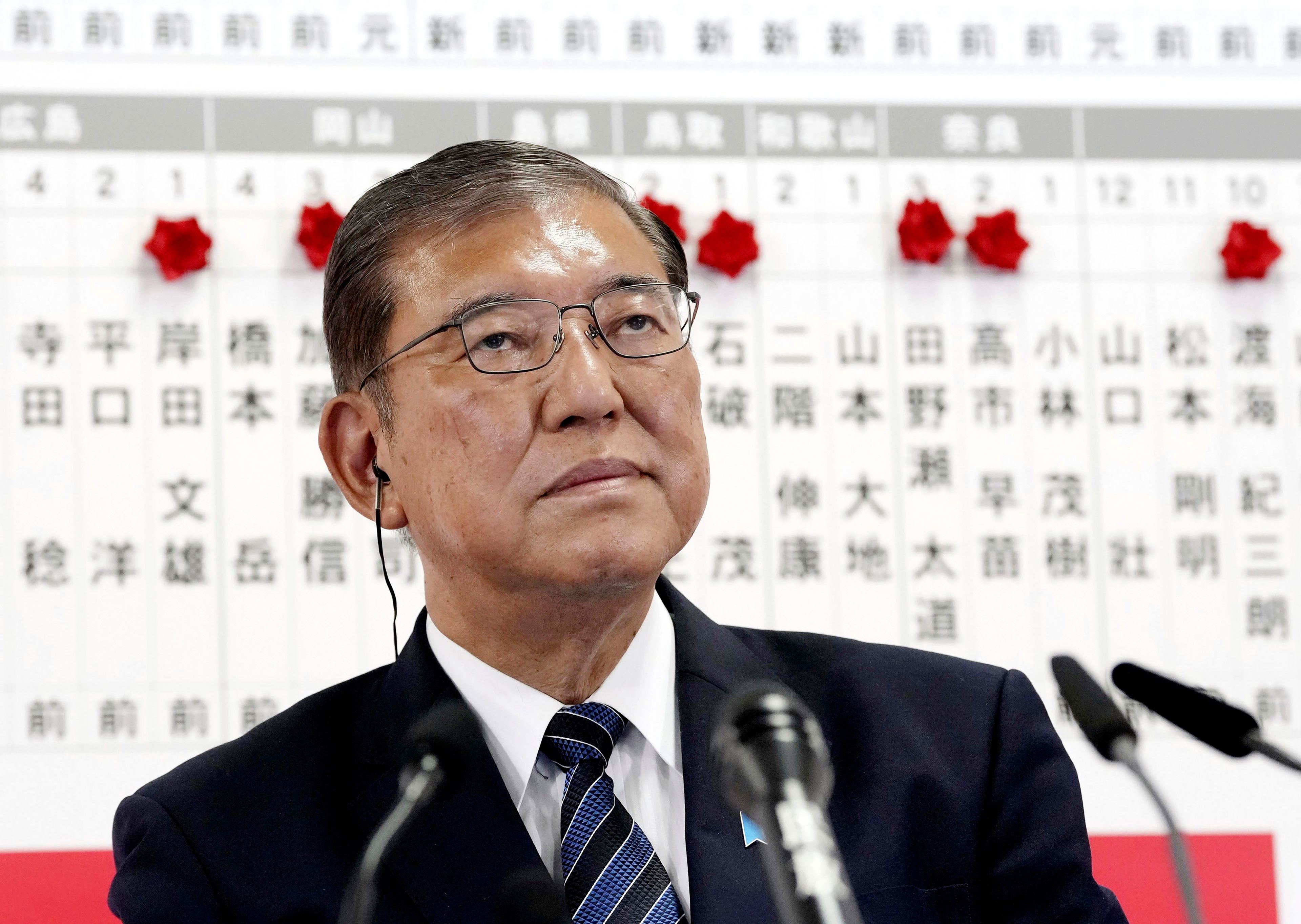 Japan's Prime Minister and president of the Liberal Democratic Party (LDP) Shigeru Ishiba pause as he speaks to the media regarding the early result of lower house election, at the LDP headquarters Sunday, Oct. 27, 2024, in Tokyo, (Kyodo News via AP)