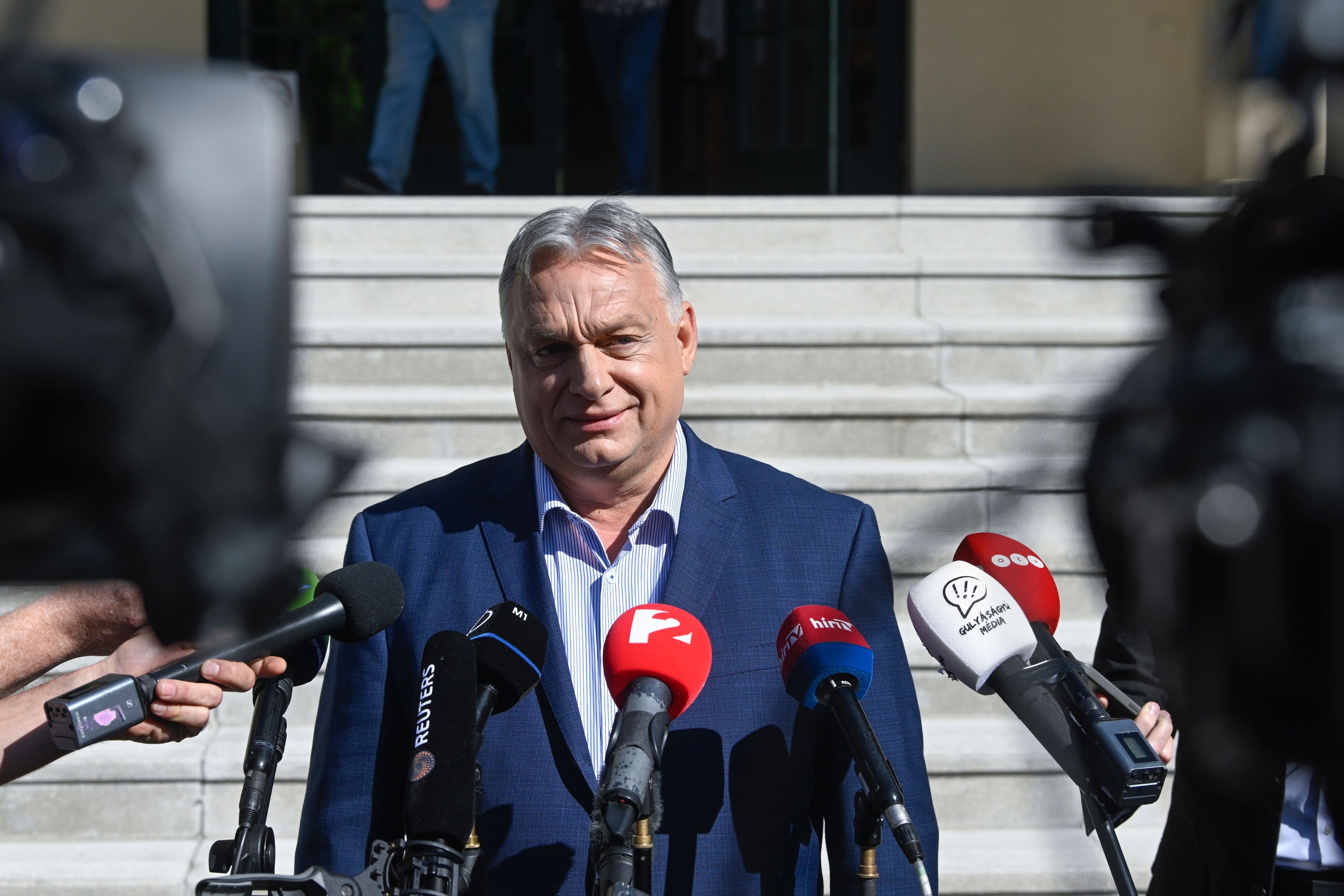 Hungarian Prime Minister Viktor Orban, leader of the ruling Fidesz party speaks to the media after casting his vote at a polling station during the European Parliament and the local elections in Budapest, Hungary, Sunday June 9, 2024.