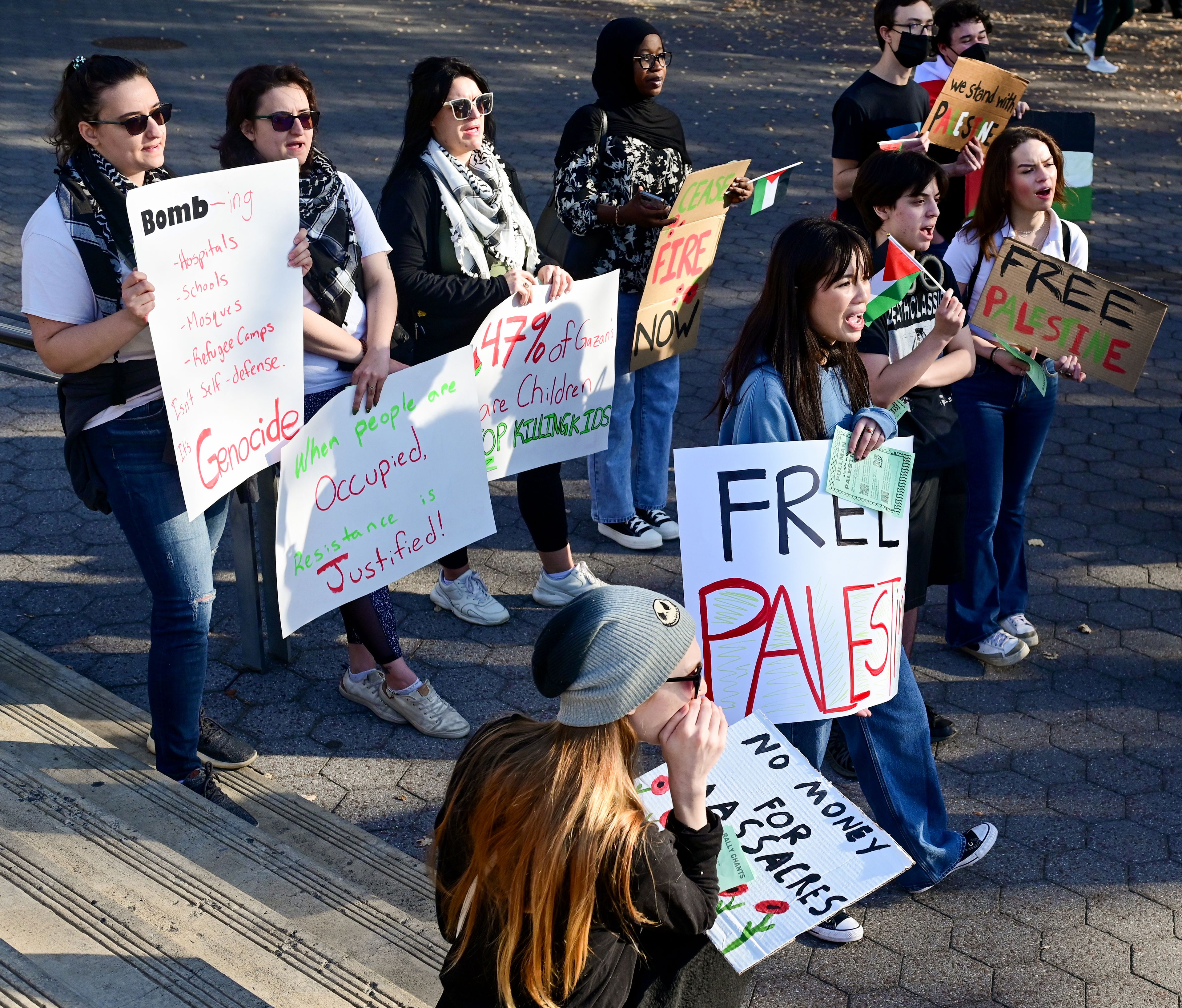 A group gathered for a solidarity for Palestine rally call and respond to chants on Washington State University campus Monday in Pullman.