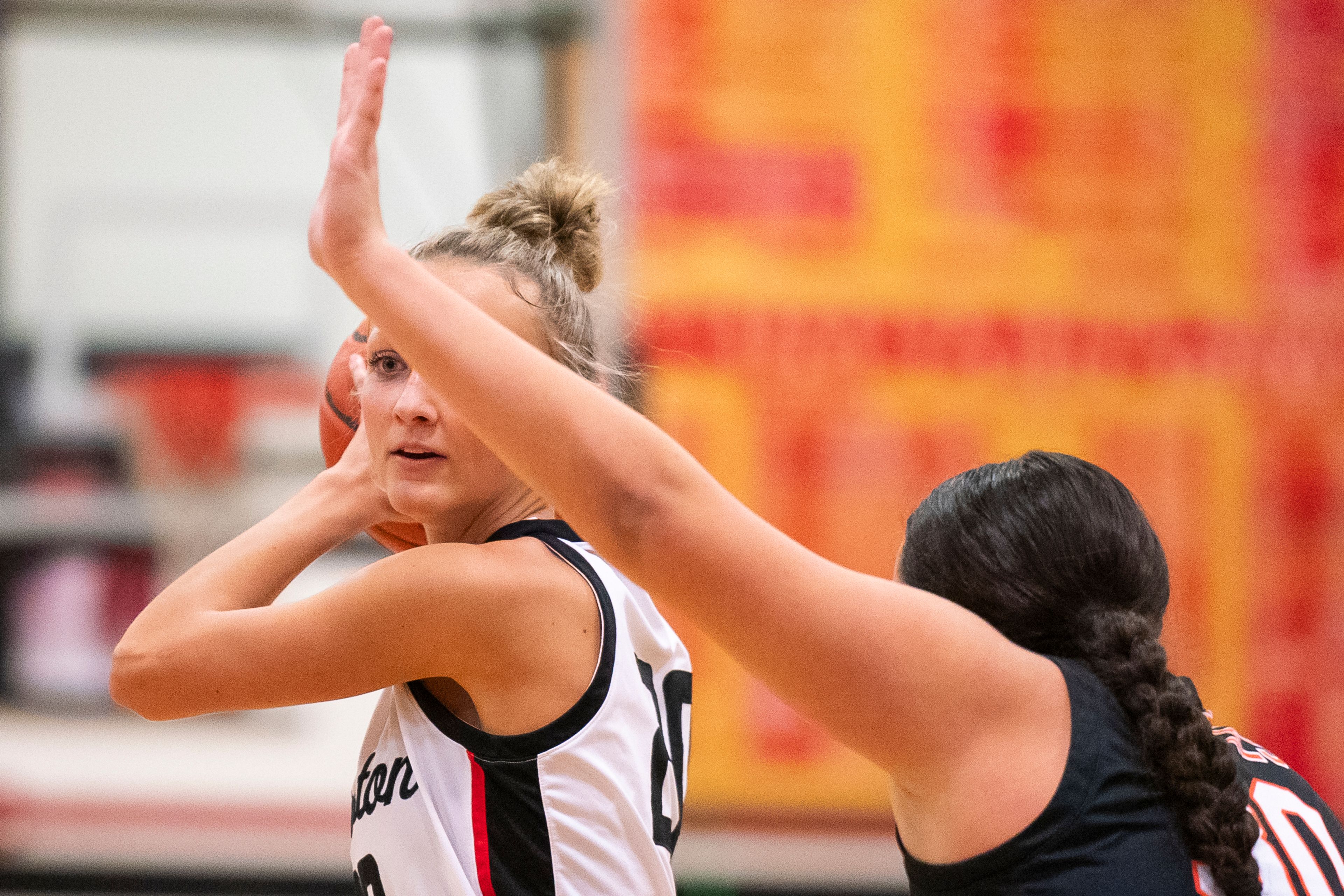 Clarkston’s Eloise Teasley, left, looks to pass the ball during their game against West Valley on Tuesday at Clarkston High School.