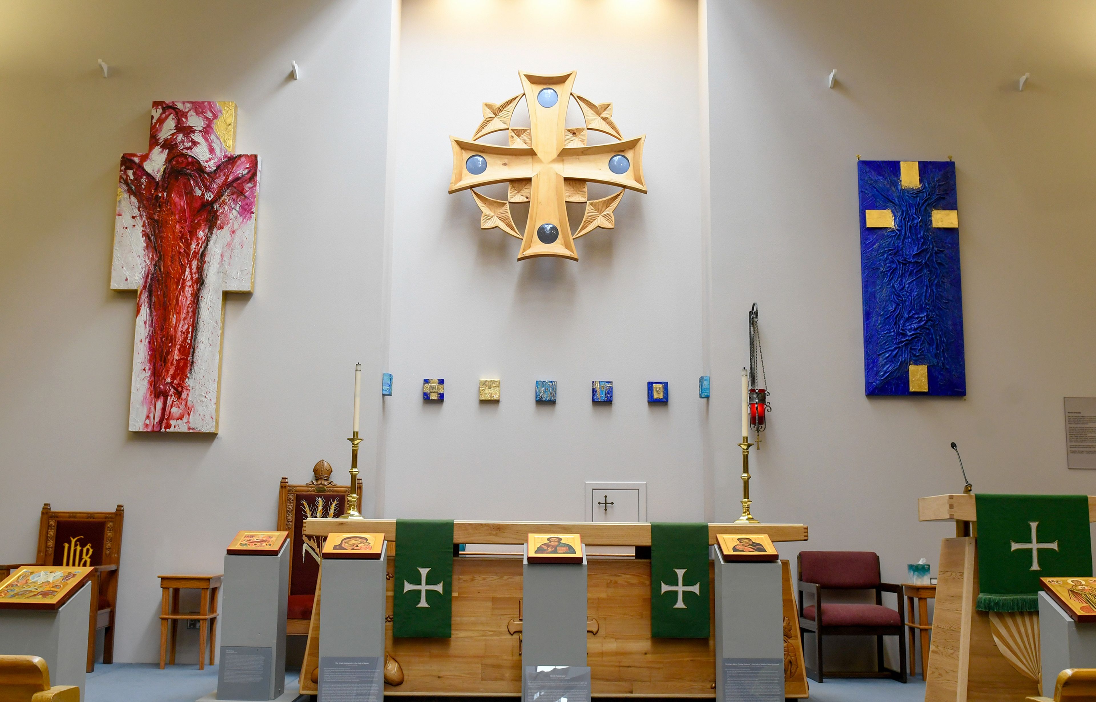 Pieces from Ludmila Pawlowskas traveling exhibit, Icons in Transformation, are displayed Thursday in the sanctuary of St. James Episcopal Church in Pullman.