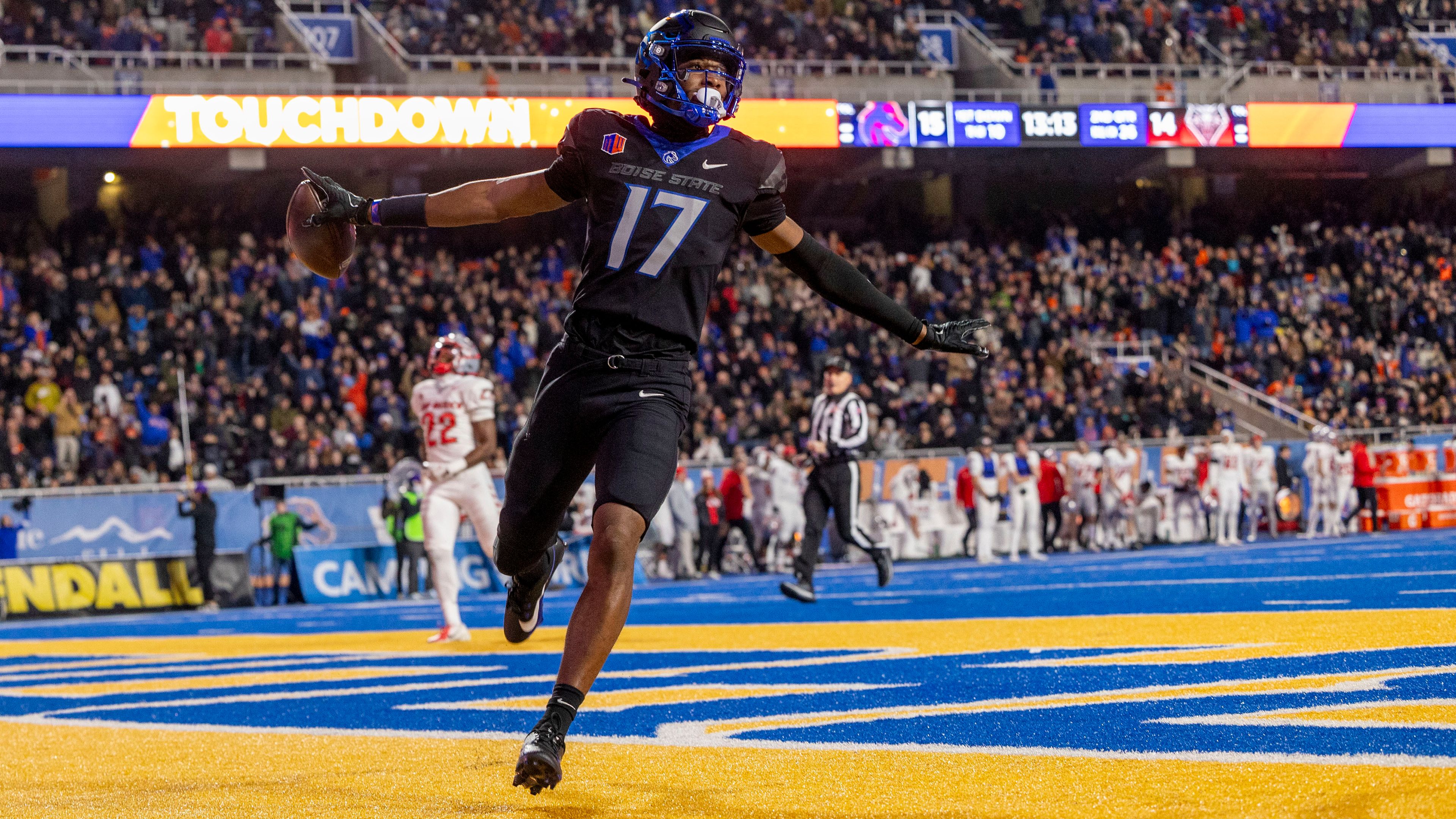 Boise State wide receiver Prince Strachan celebrates his touchdown reception against New Mexico during the second quarter of an NCAA college football game Saturday, Nov. 11, 2023, in Boise, Idaho. (Darin Oswald//Idaho Statesman via AP)