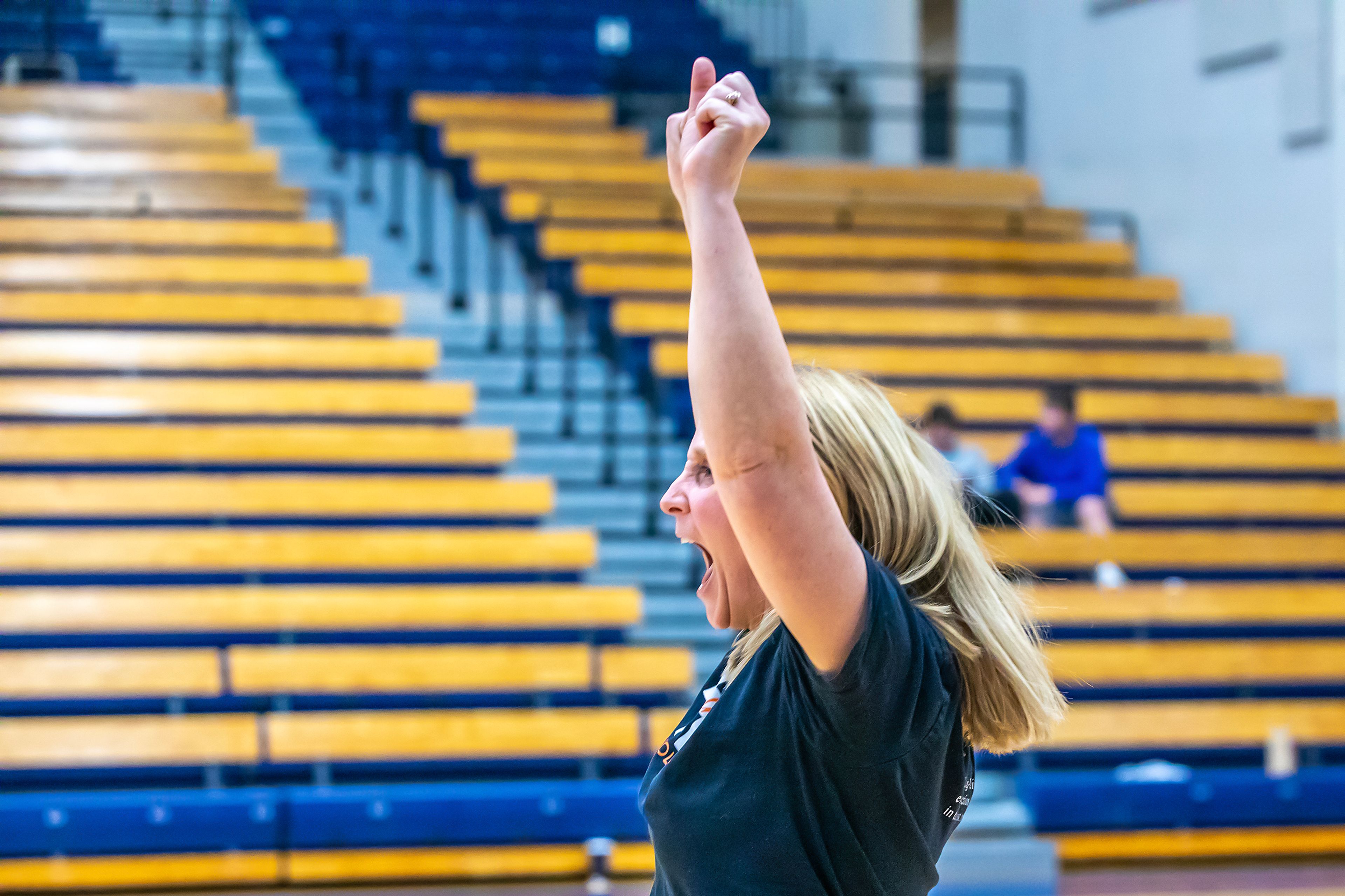 Troy head coach Debbie Blazzard cheers on her team against Potlatch in a 2A district championship Wednesday at the P1FCU Activity Center in Lewiston.