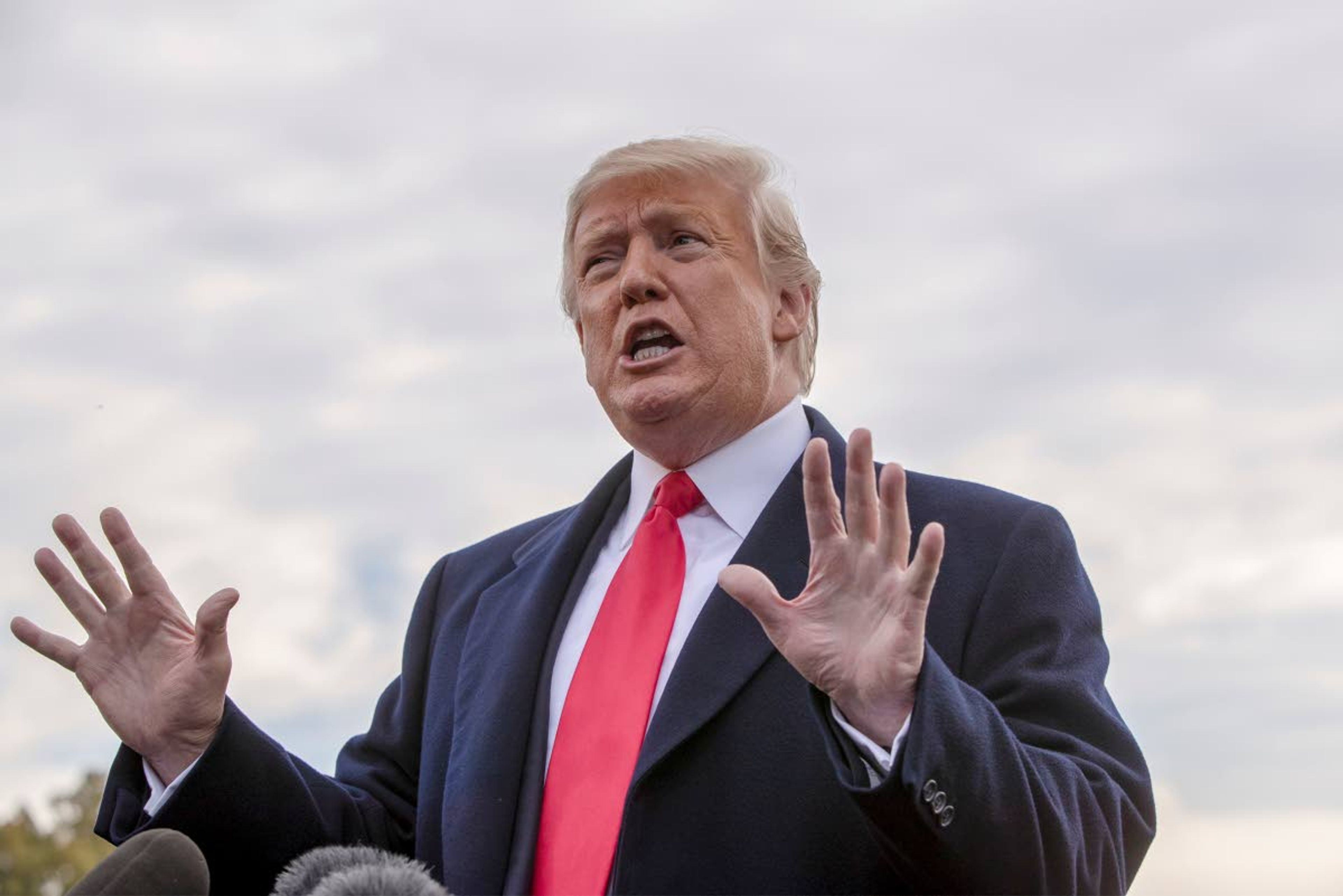 President Donald Trump talks to reporters about wanting to change the Fourteenth Amendment, before walking to Marine One on the South Lawn of the White House for a short flight to Andrews Air Force Base then on to Fort Myers, Fla., for a campaign rally ahead of the midterm elections, in Washington, Wednesday, Oct. 31, 2018. (AP Photo/J. Scott Applewhite)