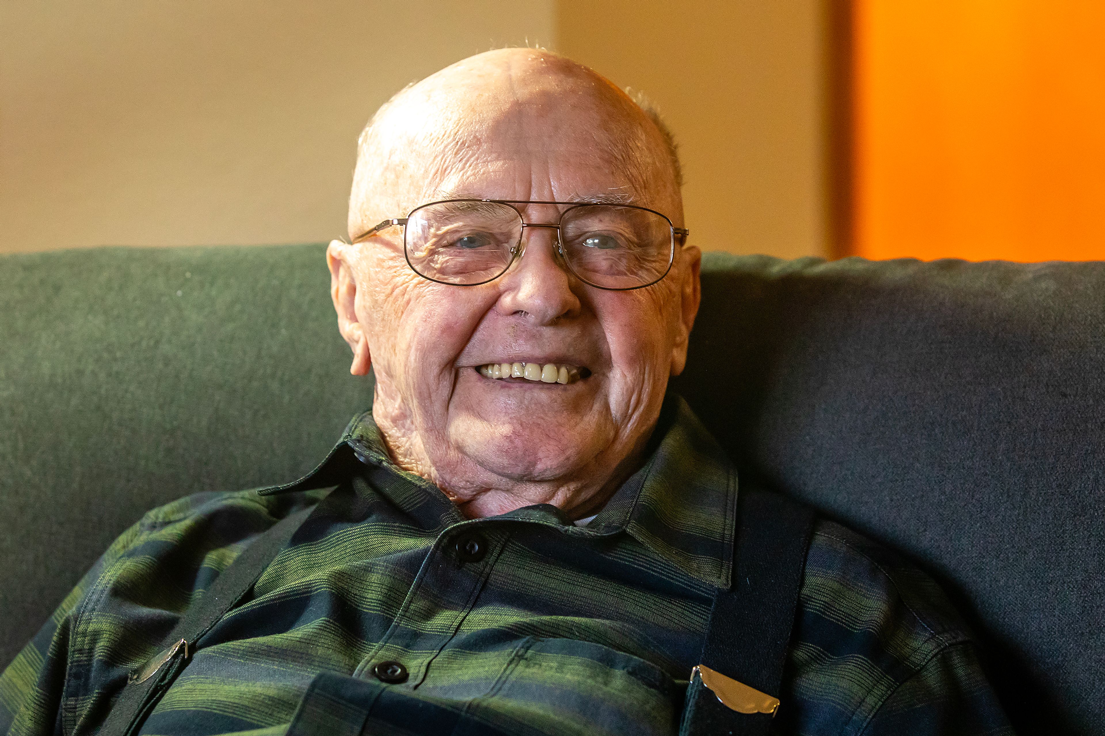 Johnny Wells talks Tuesday about turning 100 during an interview at his home in Clarkston.