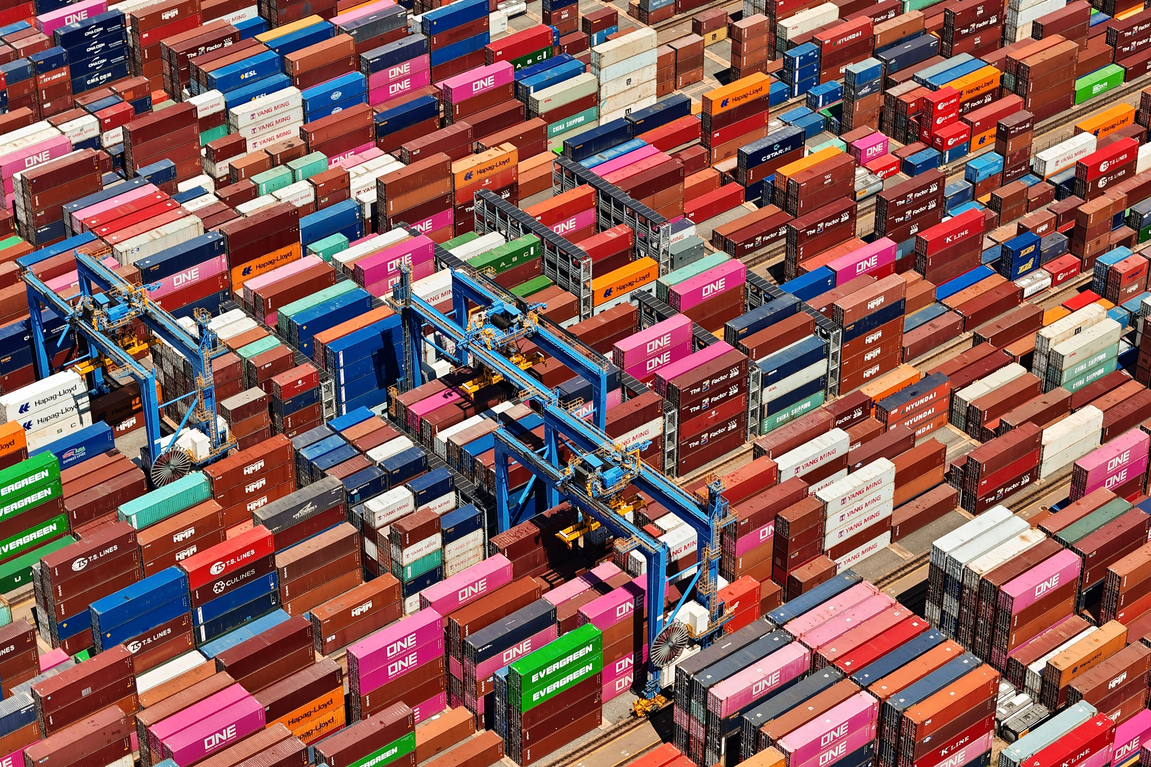 An aerial view of a container port is seen in Qingdao in east China's Shandong province Thursday, June 6, 2024. China's exports for May beat analyst expectations despite trade tensions, though imports shrank based on customs data that was released Friday.