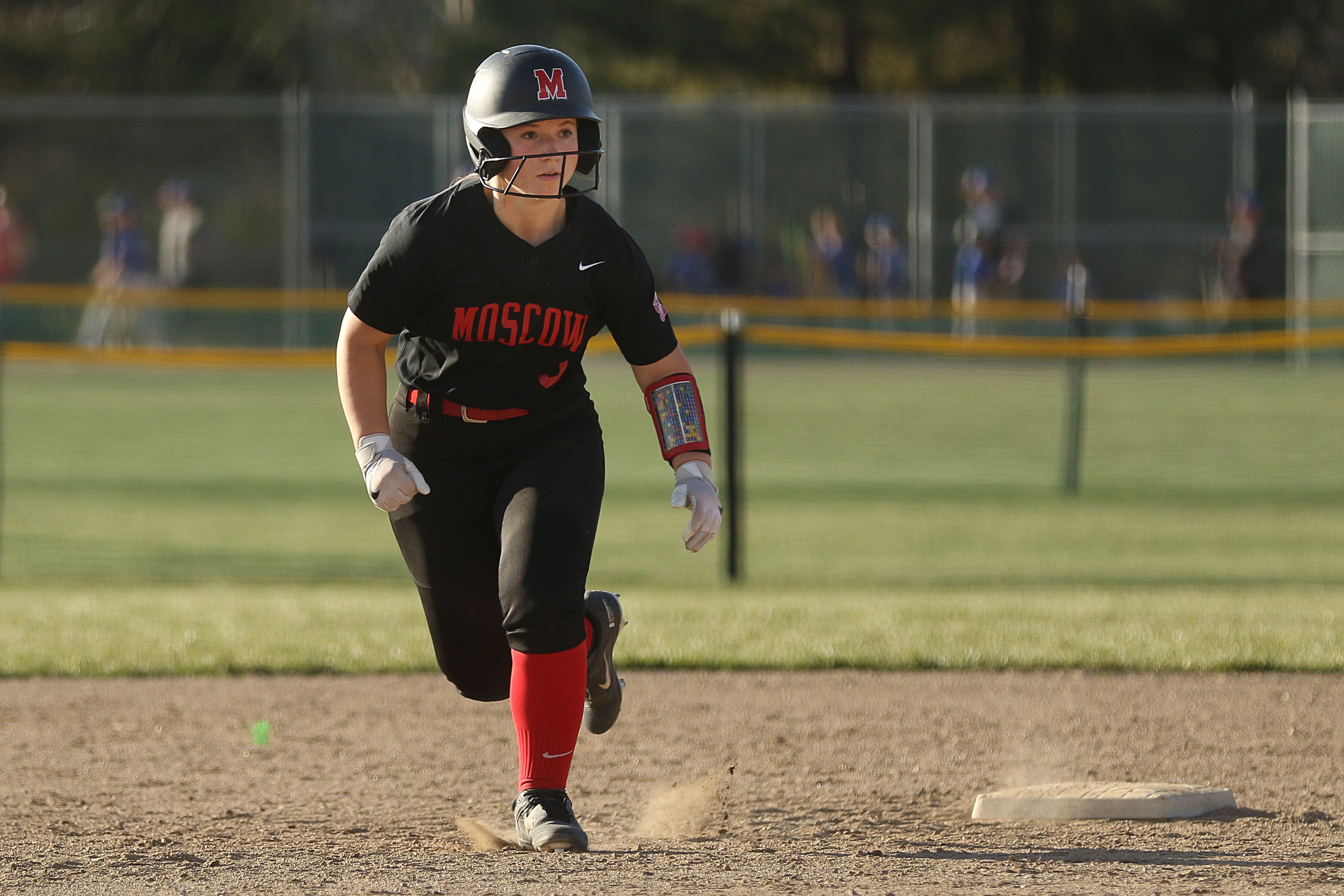 Moscow catcher Megan Highfill runs the bases against Lakeland during an Idaho Class 4A district championship game on Thursday in Moscow.