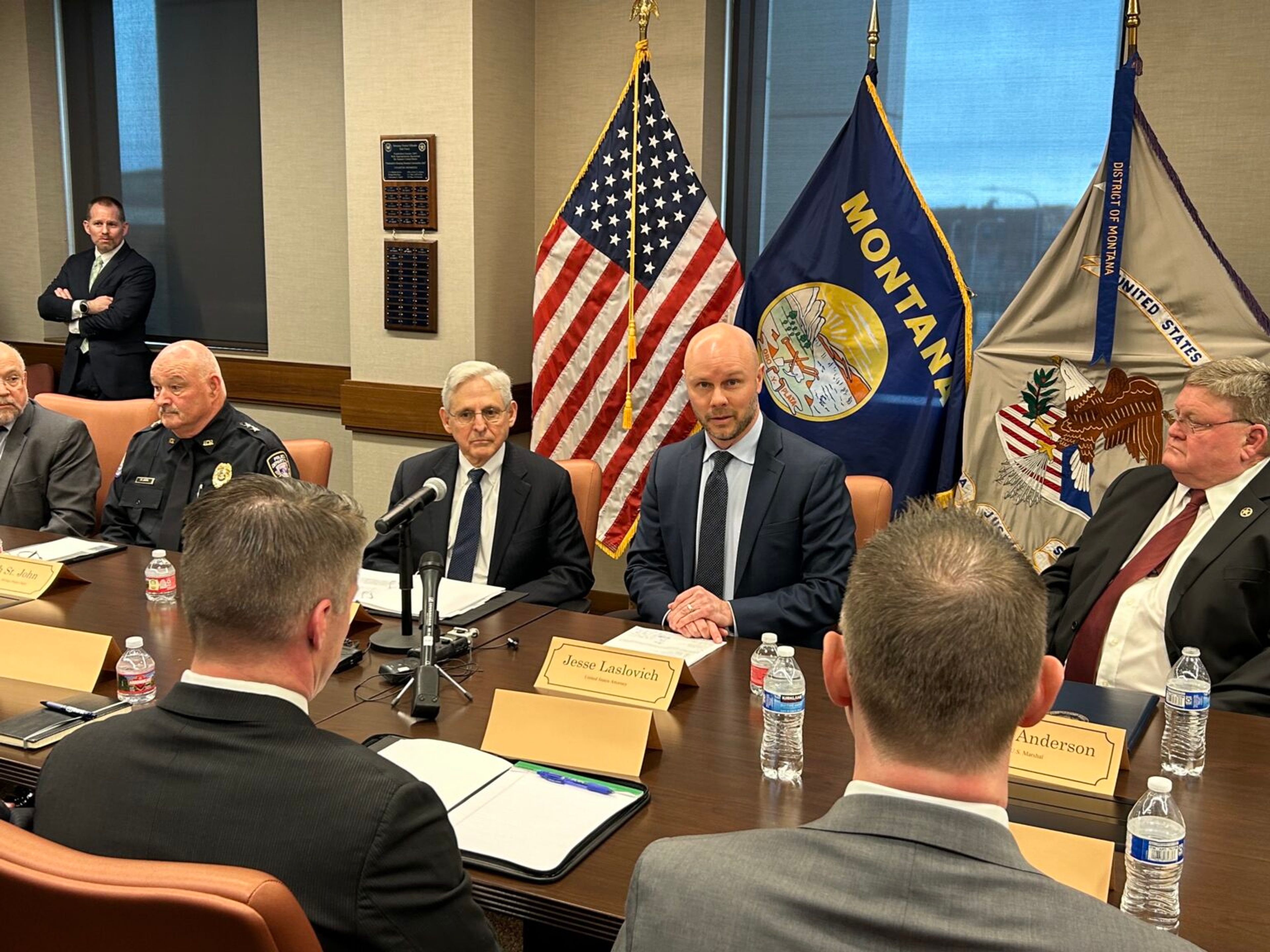 U.S. Attorney for Montana Jesse Laslovich gives opening remarks and an introduction to U.S. Attorney General Merrick Garland (left), in Billings on March 5, 2024 (Photo by Darrell Ehrlick of the Daily Montanan).