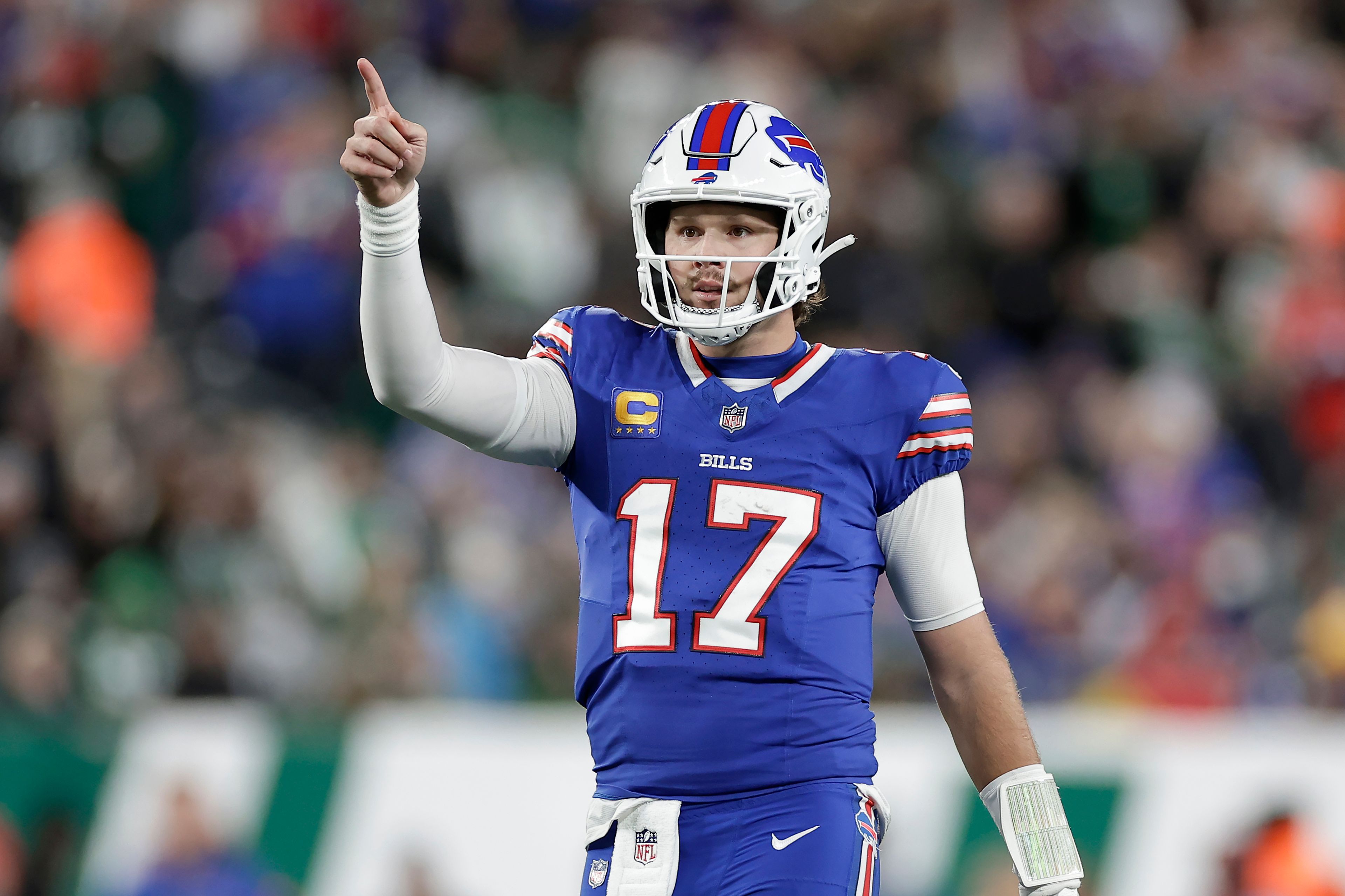 Buffalo Bills quarterback Josh Allen (17) gestures during the first half of an NFL football game against the New York Jets in East Rutherford, N.J., Monday, Oct. 14, 2024. (AP Photo/Adam Hunger)