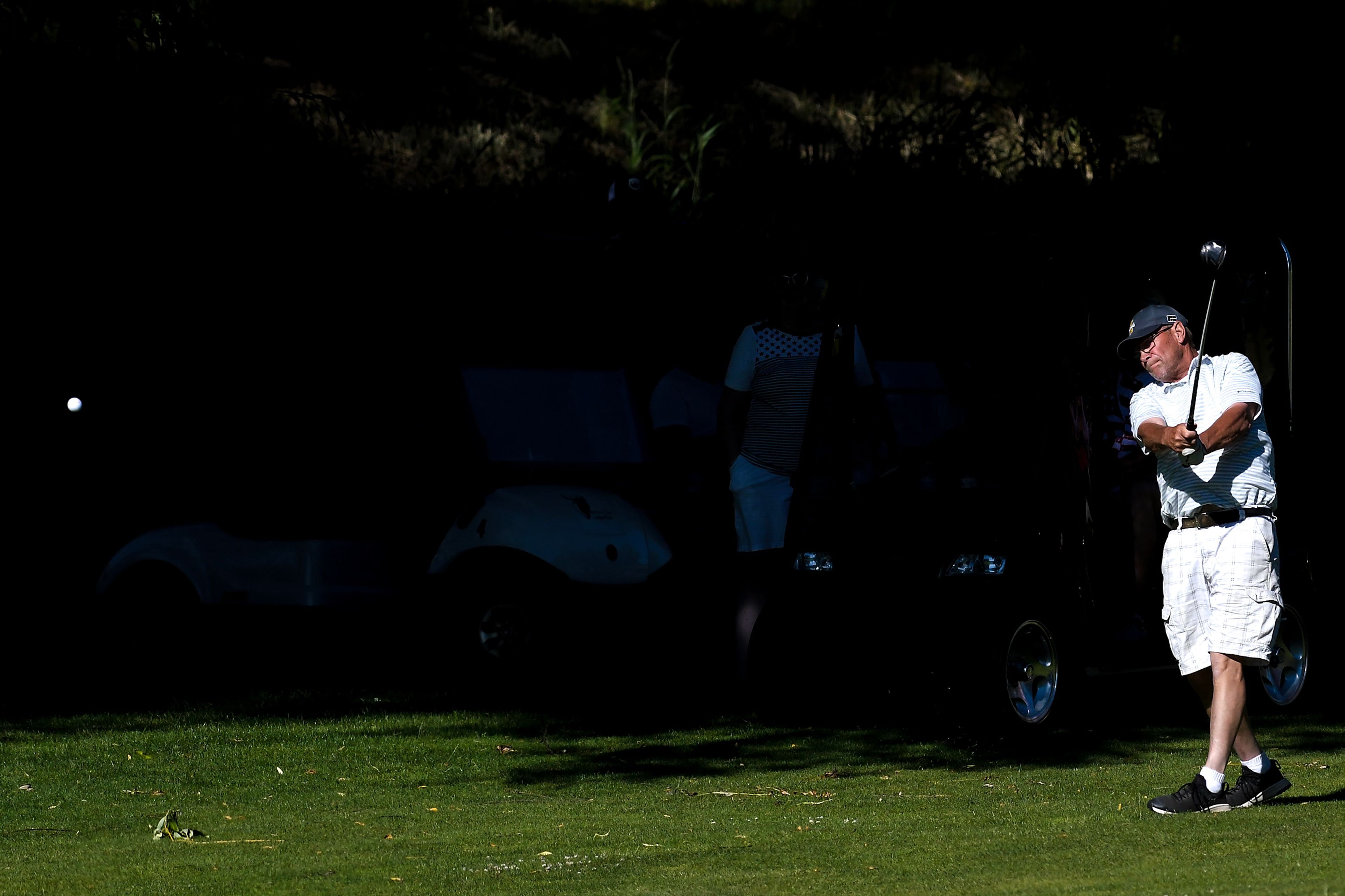 Kyle Nelson hits his ball for the green at the annual Moscow Elks Lodge Golf Club Sole Survivor tournament Thursday in Moscow.