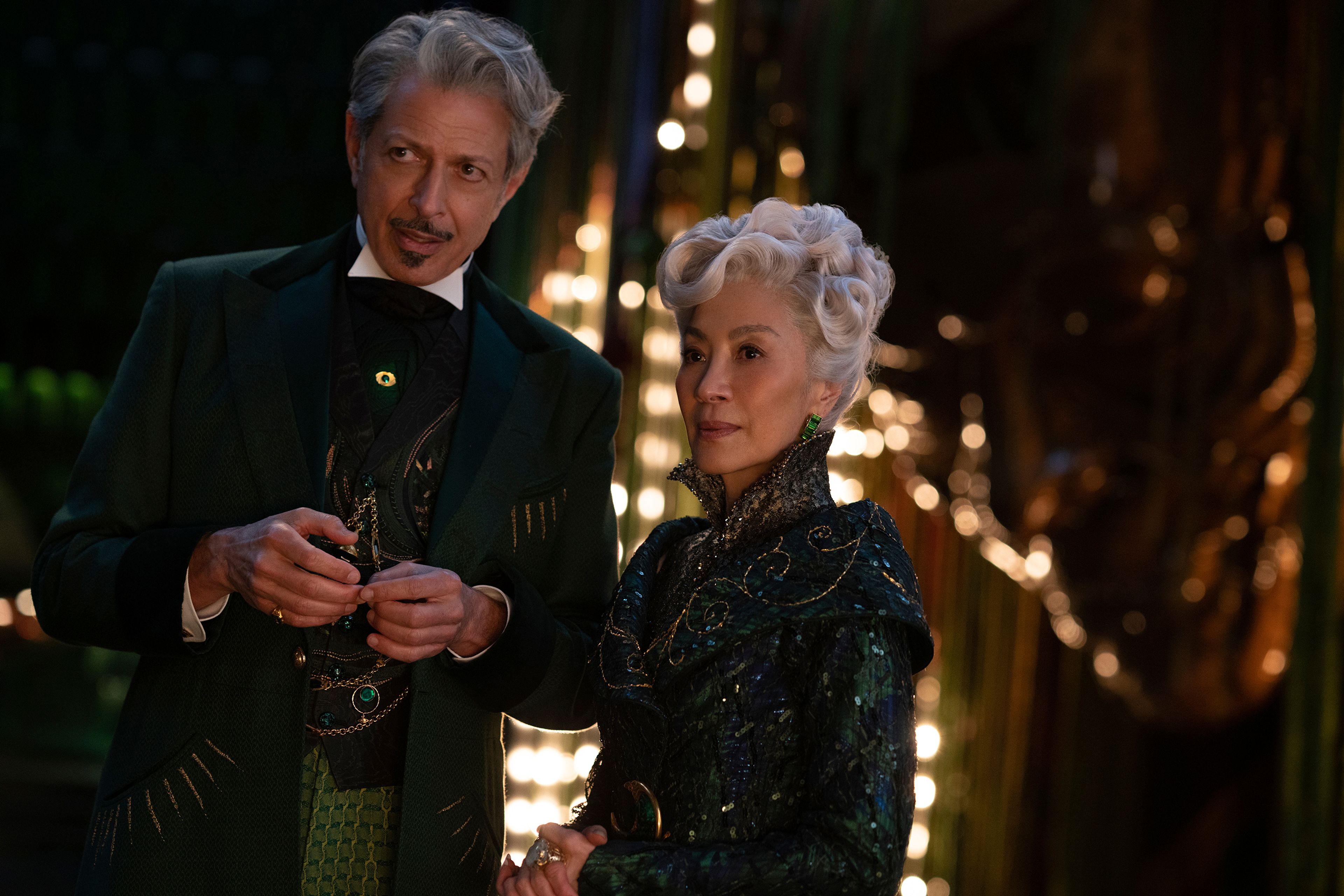 This image released by Universal Pictures shows Jeff Goldblum as The Wizard of Oz, left, and Michelle Yeoh as Madam Morrible in a scene from the film "Wicked."