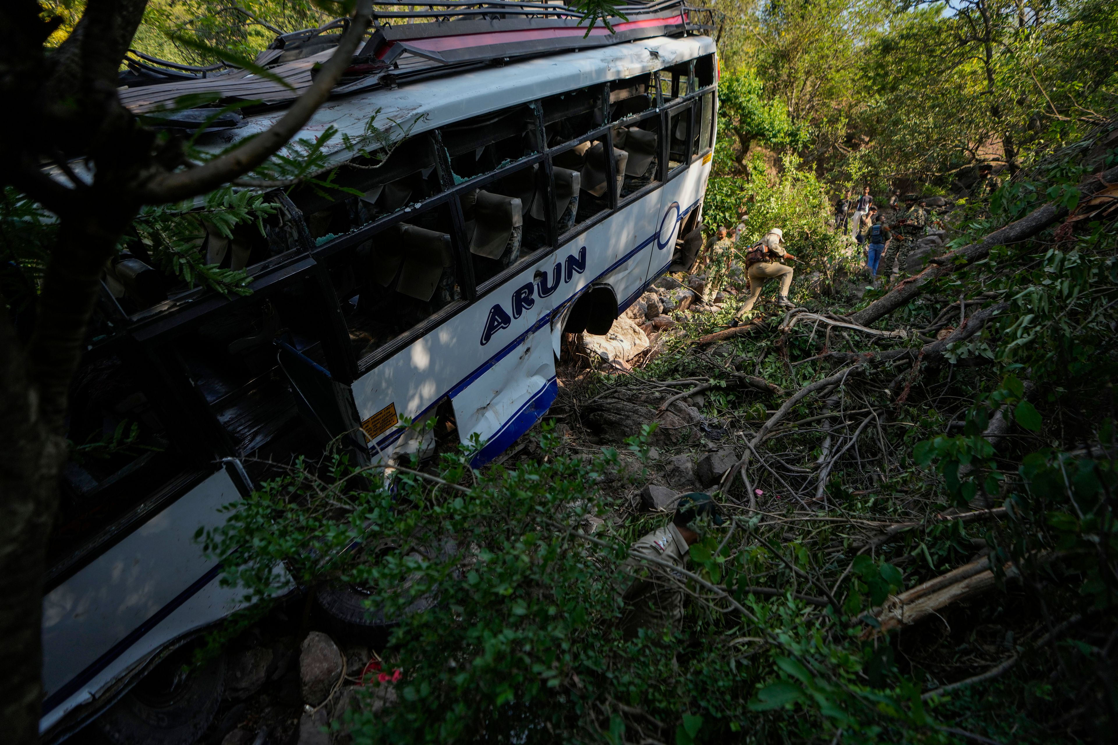 The wreckage of a bus that fell into a deep gorge on Sunday after being fired at by suspected militants in Reasi district, Jammu and Kashmir, Monday, June 10, 2024. The bus was carrying pilgrims to the base camp of the famed Hindu temple Mata Vaishno Devi when it came under attack killing at least nine people.