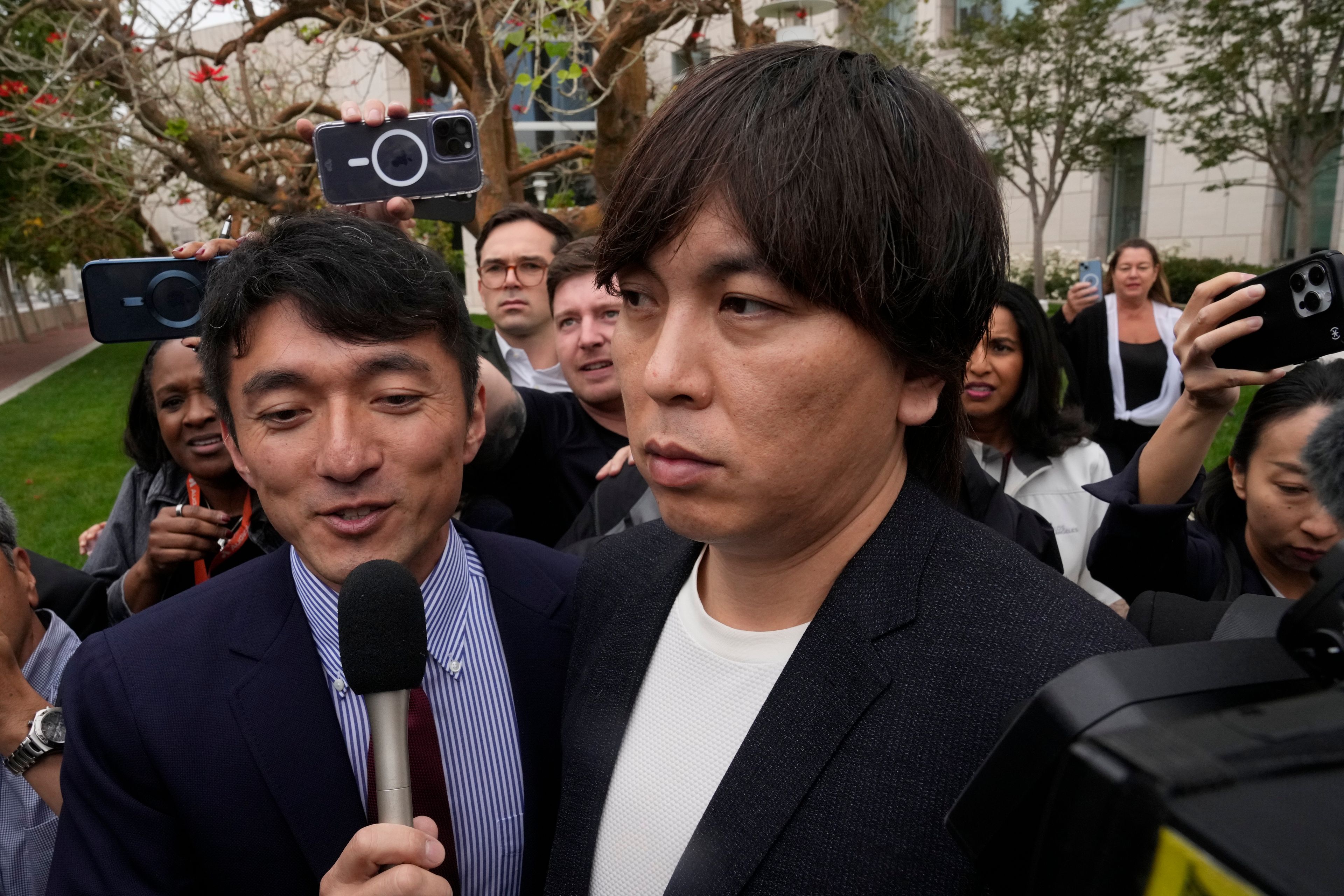 Ippei Mizuhara, the former interpreter for the Los Angeles Dodgers baseball star Shohei Ohtani, leaves federal court in Los Angeles, Tuesday, June 4, 2024, after pleading guilty to bank and tax fraud in a sports betting case.