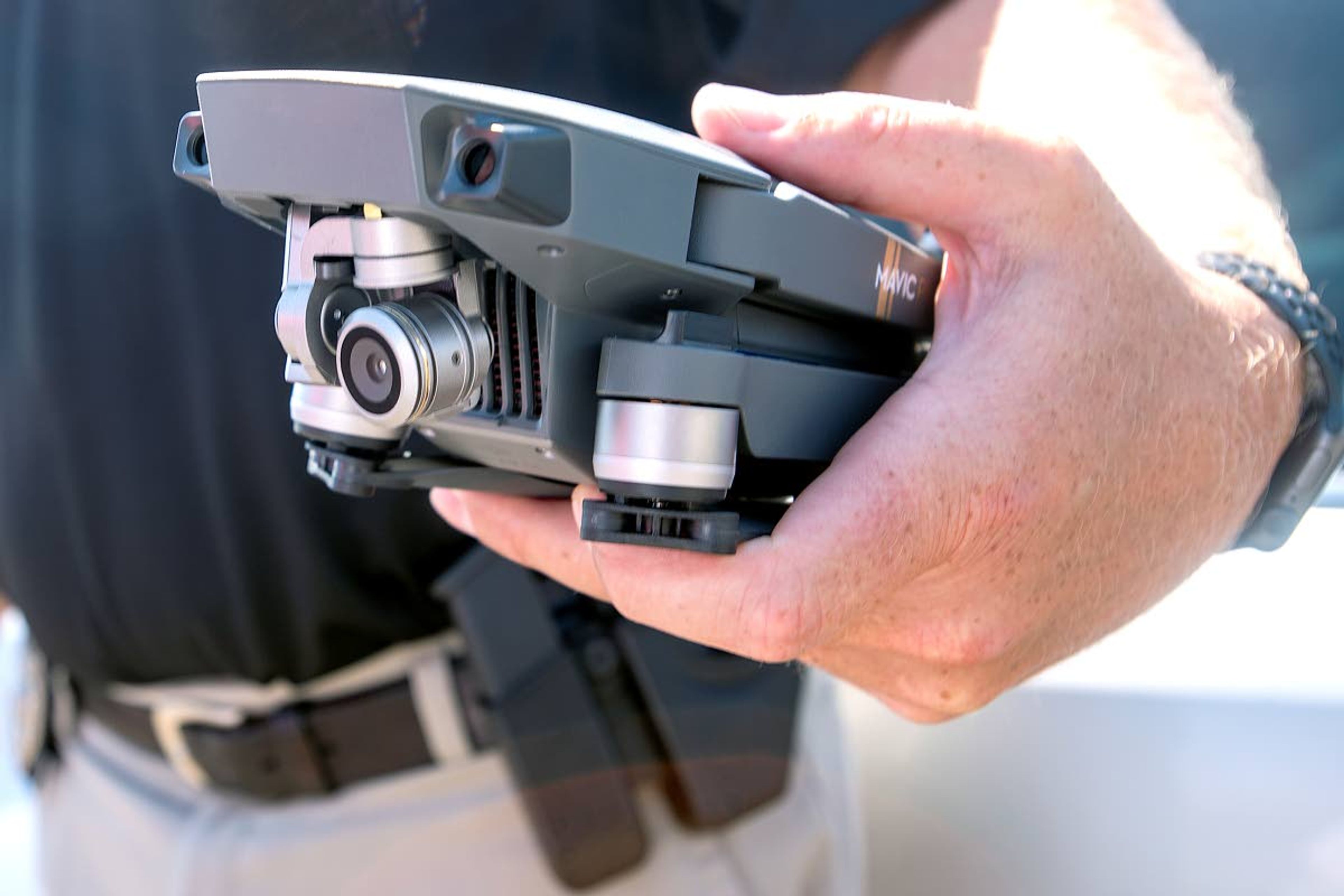 Clarkston Police Department Detective Colby Martin shows the drone he uses for work on Thursday afternoon in Clarkston.