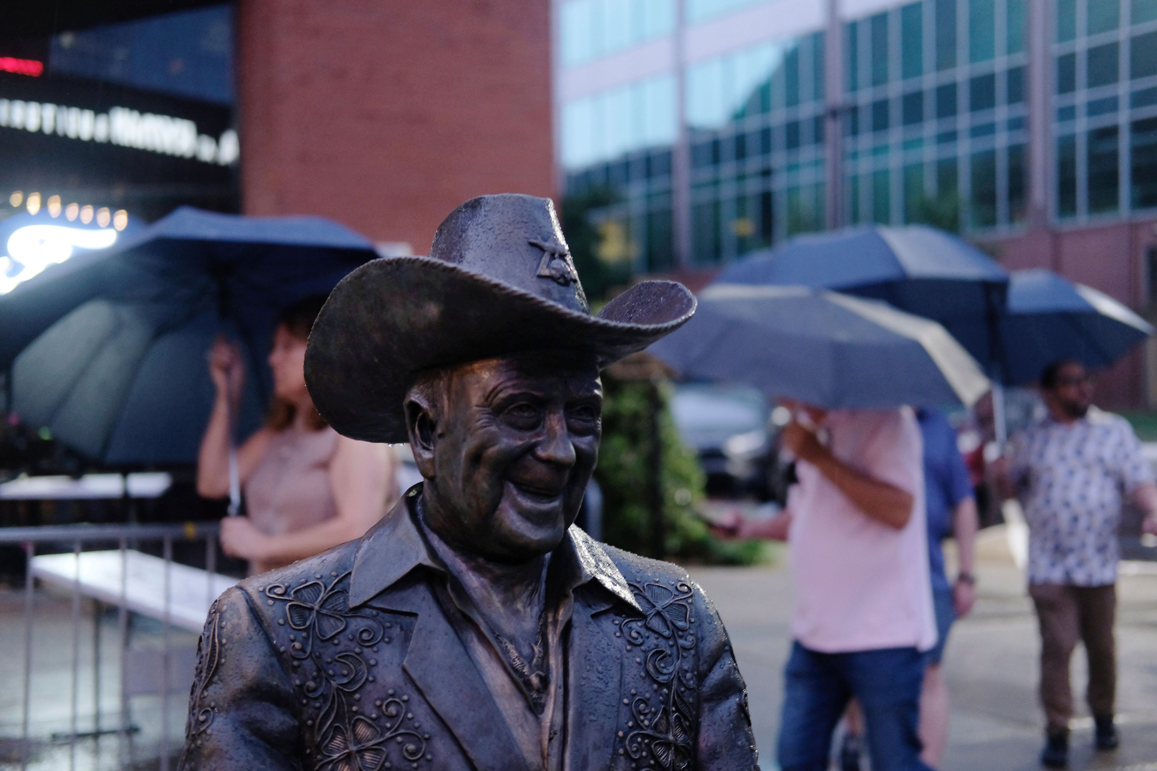 A statue of Grand Ole Opry star Little Jimmy Dickens is displayed outside the Ryman Auditorium in Nashville, Tenn., on July 30, 2024.