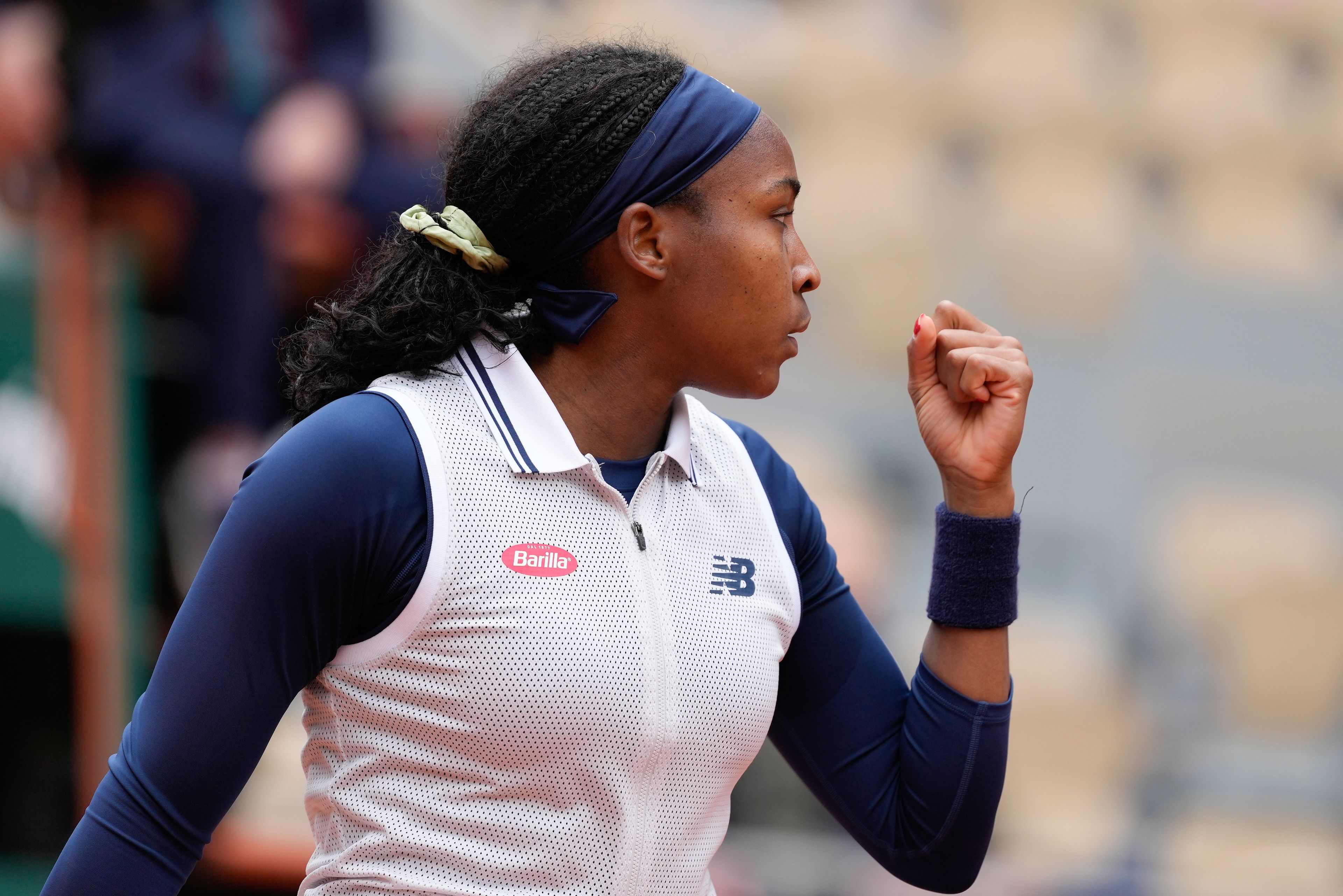 Coco Gauff of the U.S. clenches her fist after scoring a point against Italy's Elisabetta Cocciaretto during their fourth round match of the French Open tennis tournament at the Roland Garros stadium in Paris, Sunday, June 2, 2024.