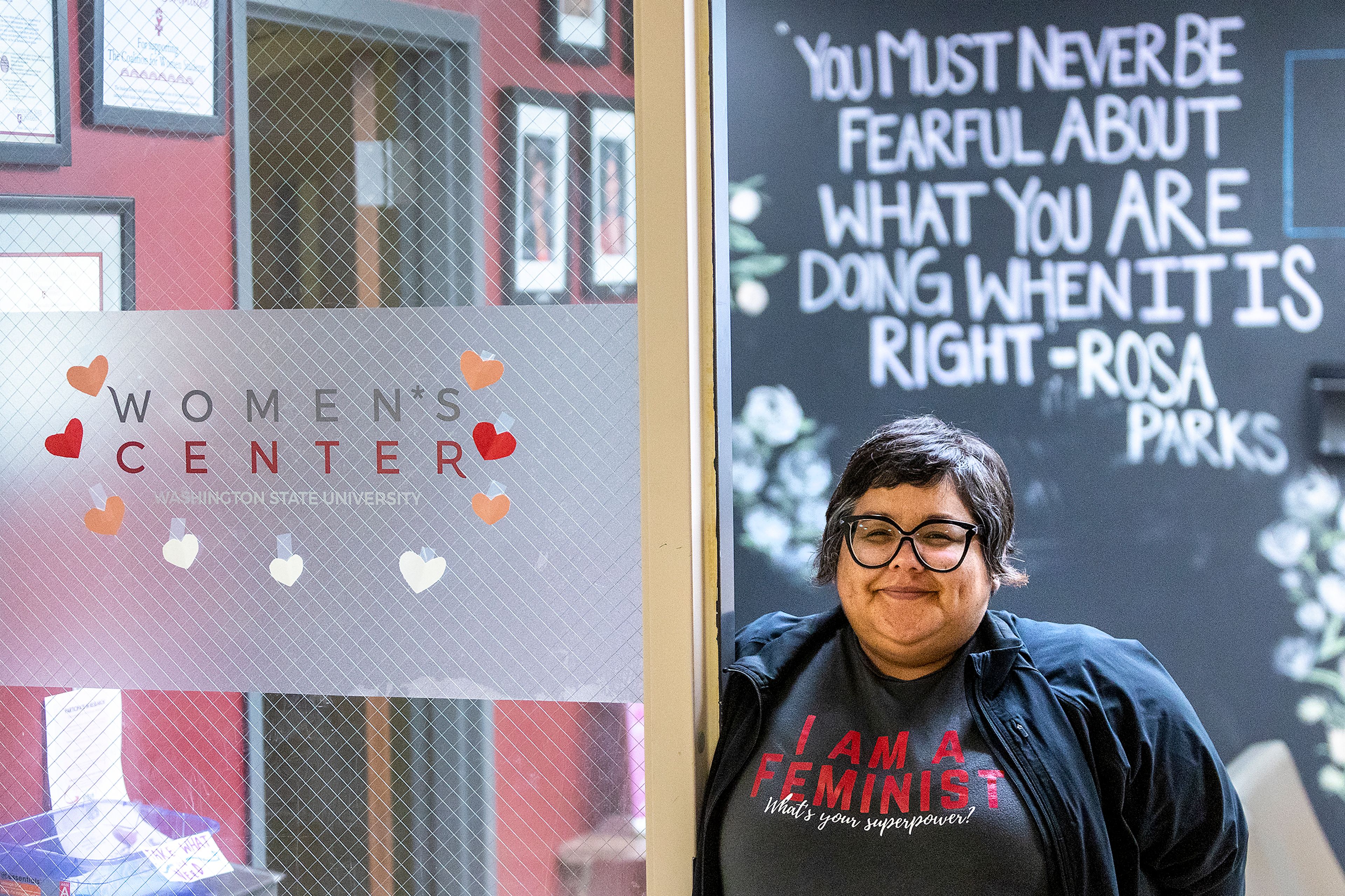 Amy Sharp, director of the Washington State University Women*s Center, stands in the doorway for a photo.