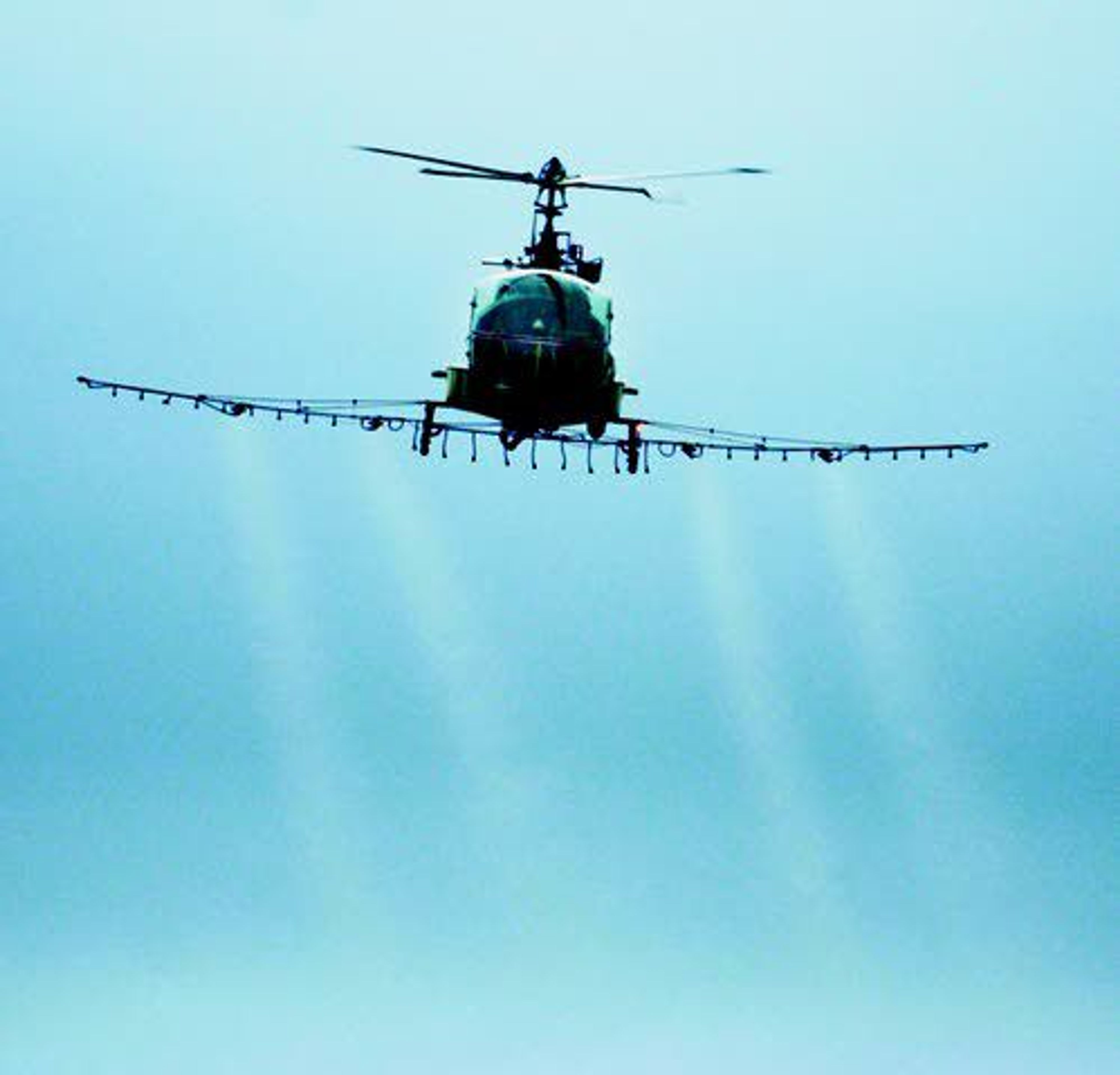 In this May 22, 2007, file photo, pilot Dave McCarty sprays a pesticide near St. Helens, Ore.