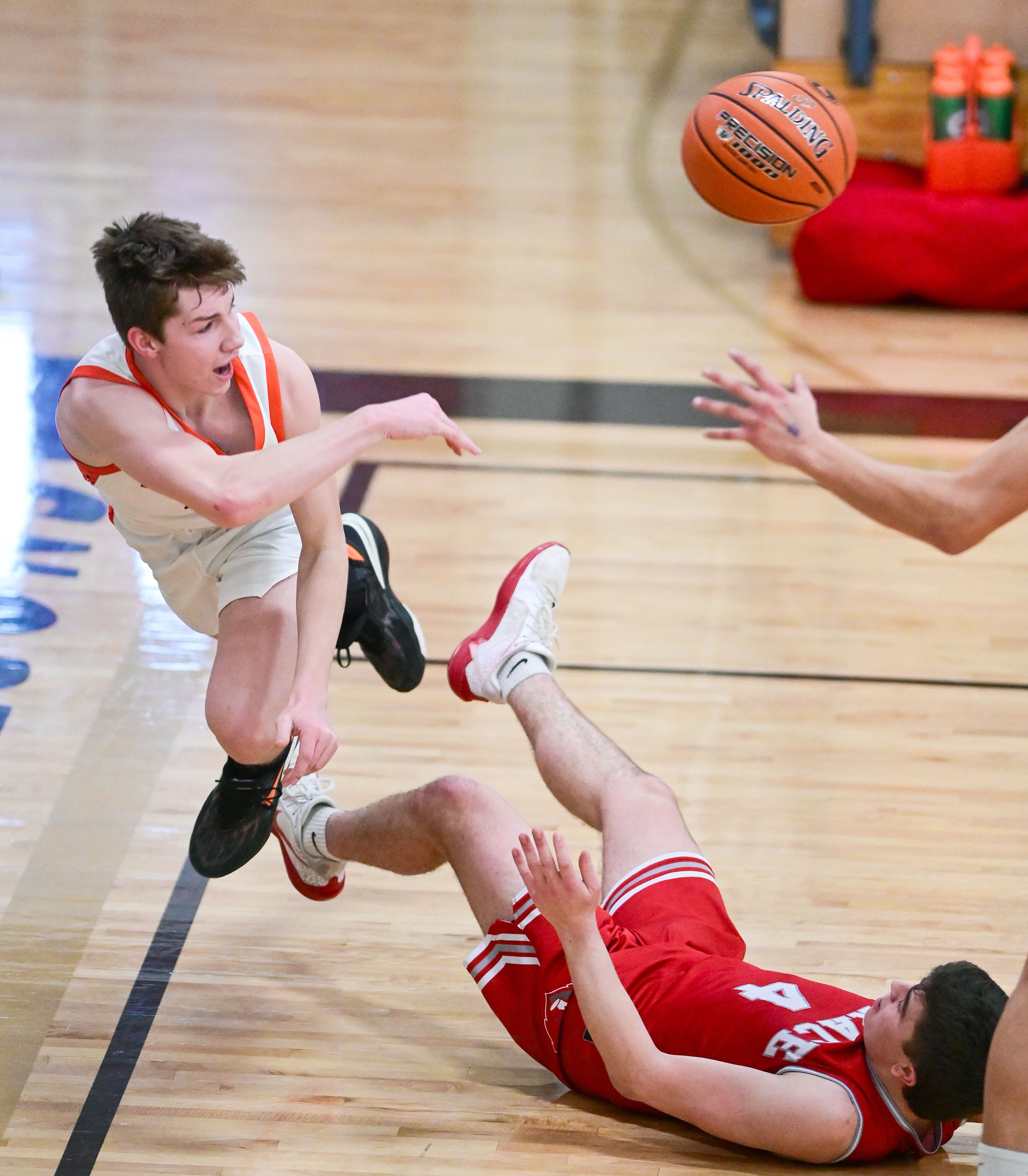 Kendrick's Maddox Kirkland throws the ball in an attempt to stay in bounds while playing Grace at the Idaho 2A state tournament on Friday in Caldwell, Idaho.