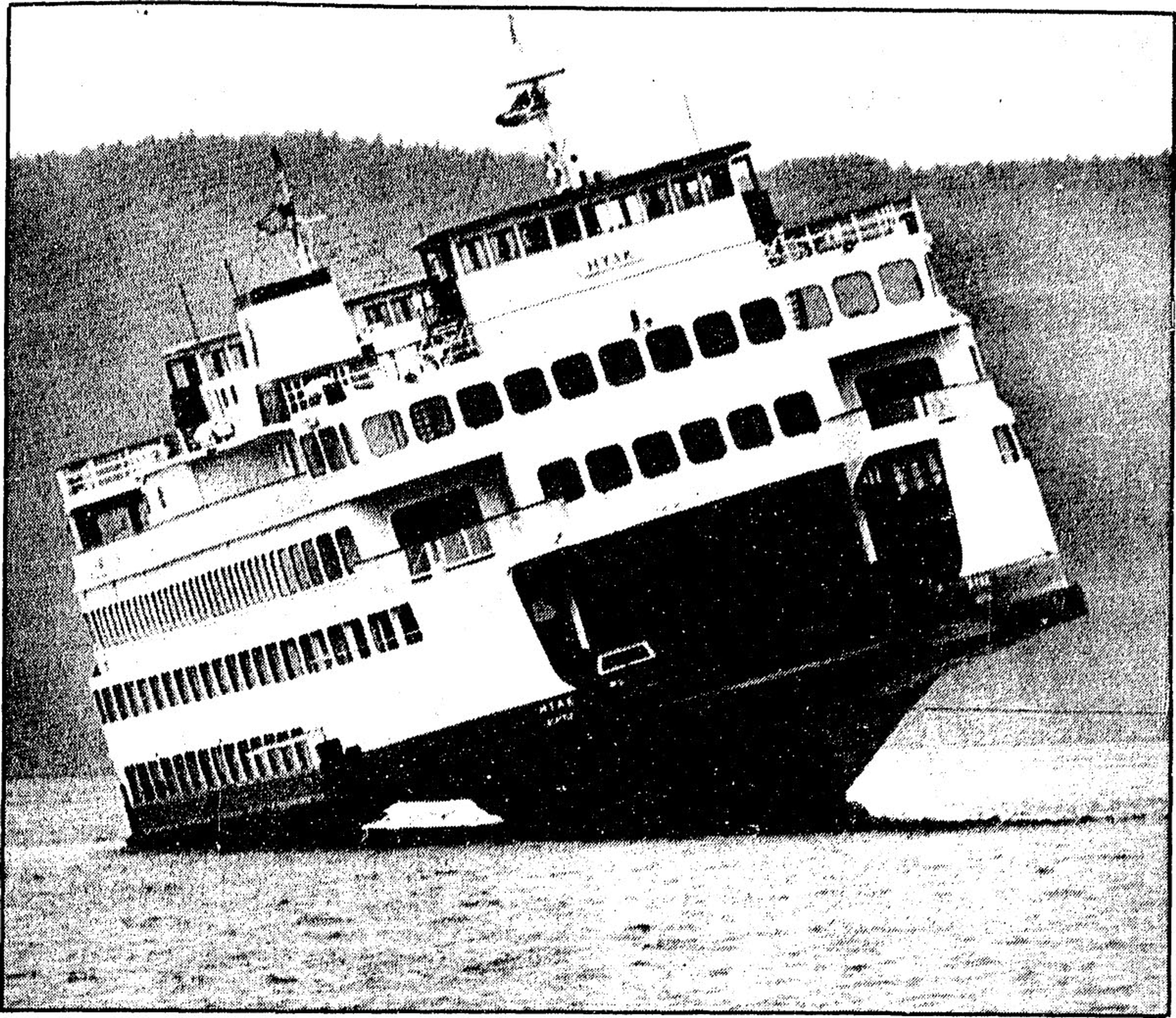 The ferry Hyak sits grounded off the Anacortes, Wash., ferry terminal Monday morning. It floated free when the tide came in later in the day and returned to its dock. (Associated Press)