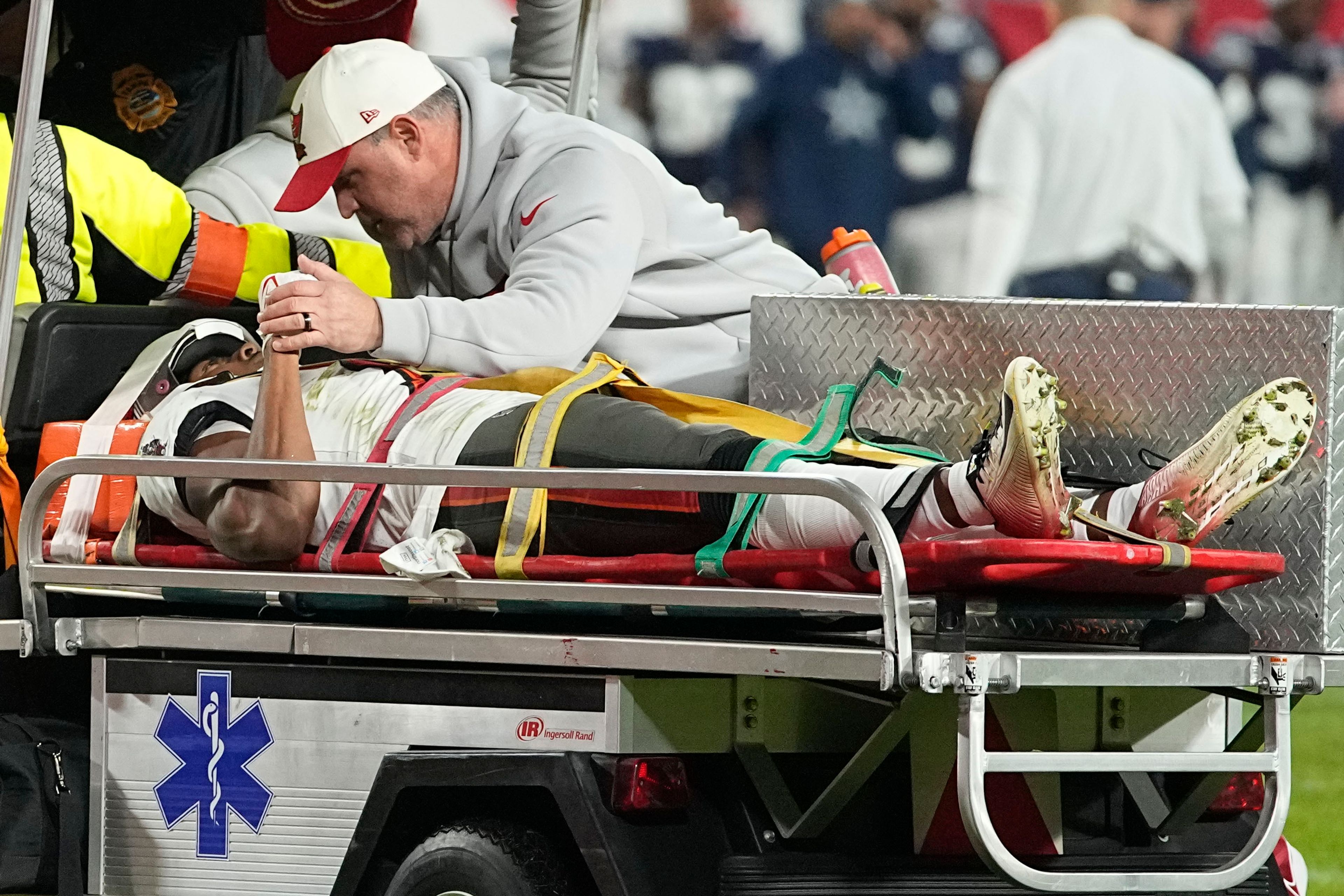 Tampa Bay Buccaneers wide receiver Russell Gage is taken off the filed after being injured against the Dallas Cowboys during the second half of an NFL wild-card football game, Monday, Jan. 16, 2023, in Tampa, Fla. (AP Photo/Chris Carlson)