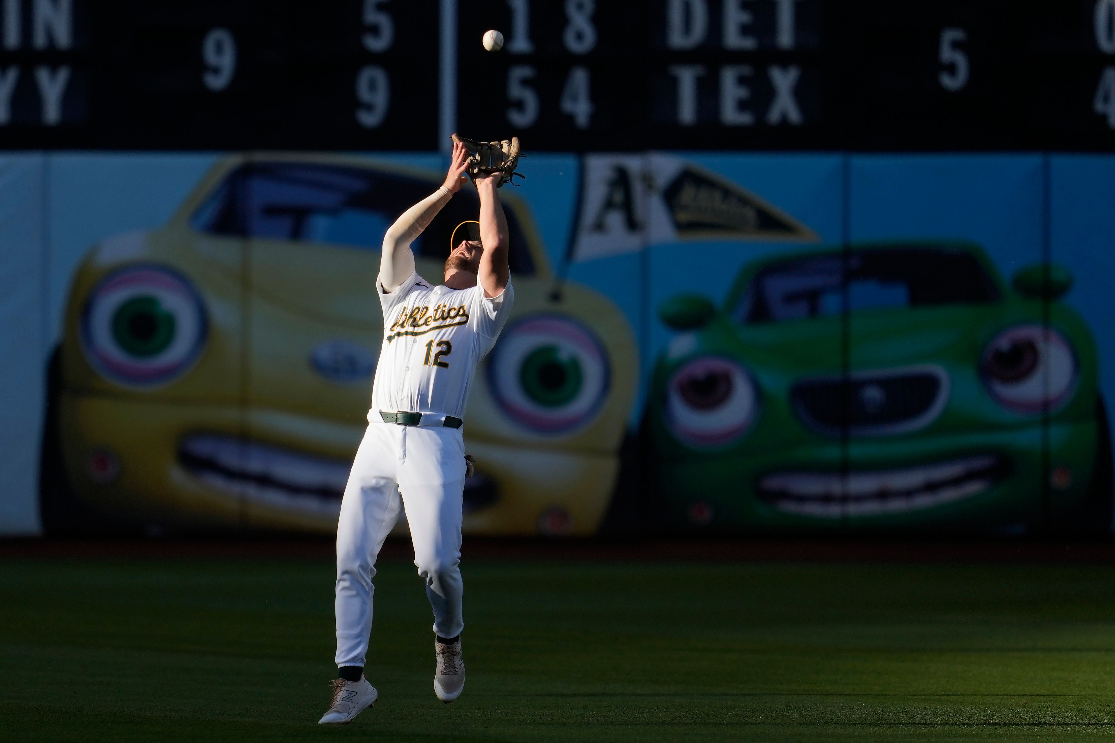 Oakland Athletics shortstop Max Schuemann catches a popup hit by Seattle Mariners' J.P. Crawford during the first inning of a baseball game in Oakland, Calif., Wednesday, June 5, 2024. (AP Photo/Jeff Chiu)