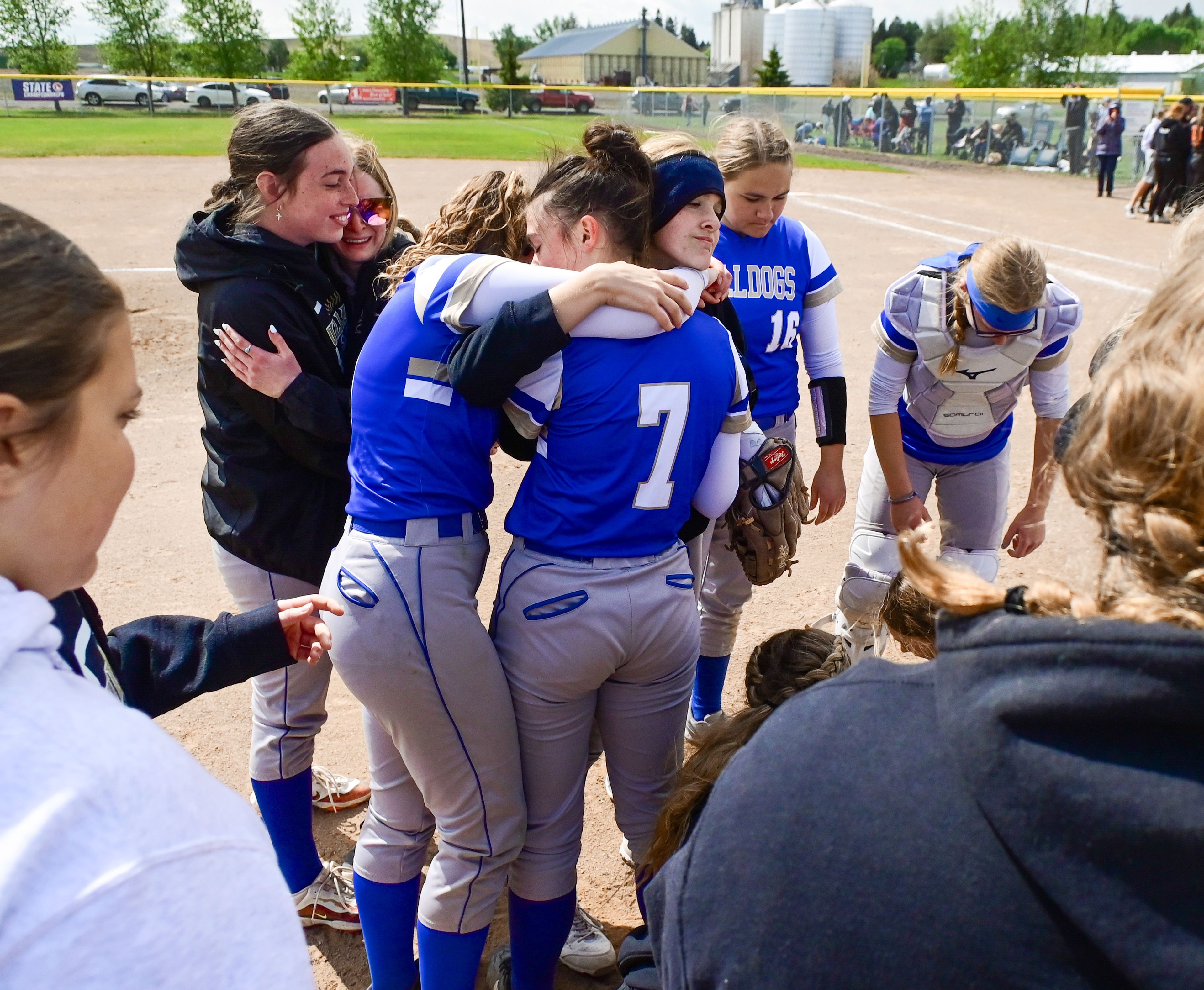 Genesee players embrace after winning the Idaho Class 1A state championship game against Kendrick on Friday in Genesee.