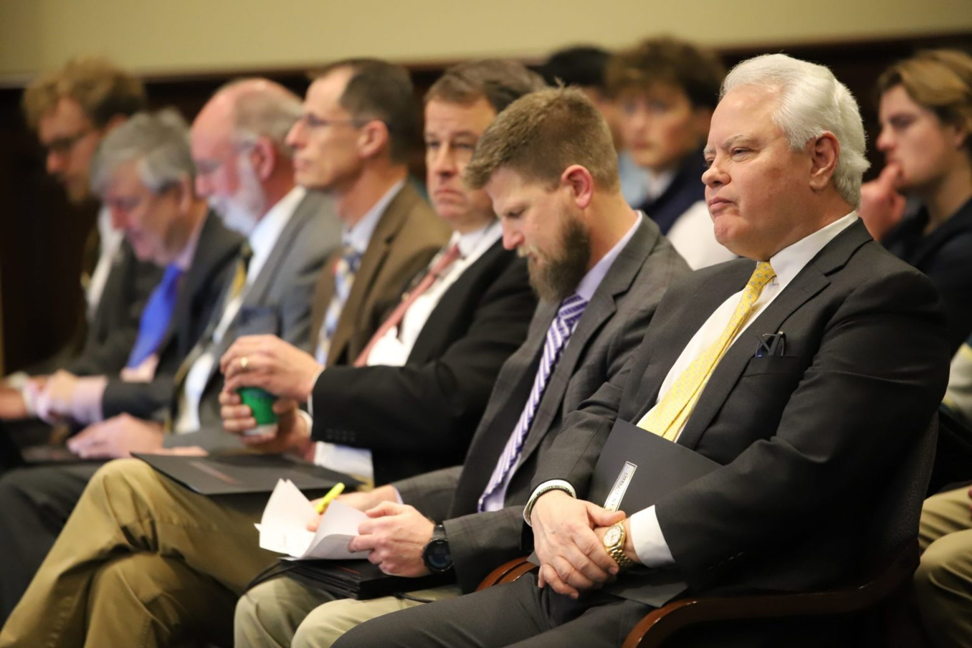 University of Idaho President C. Scott Green, foreground, is flanked by UI and State Board of Education officials at a House State Affairs Committee hearing in February.