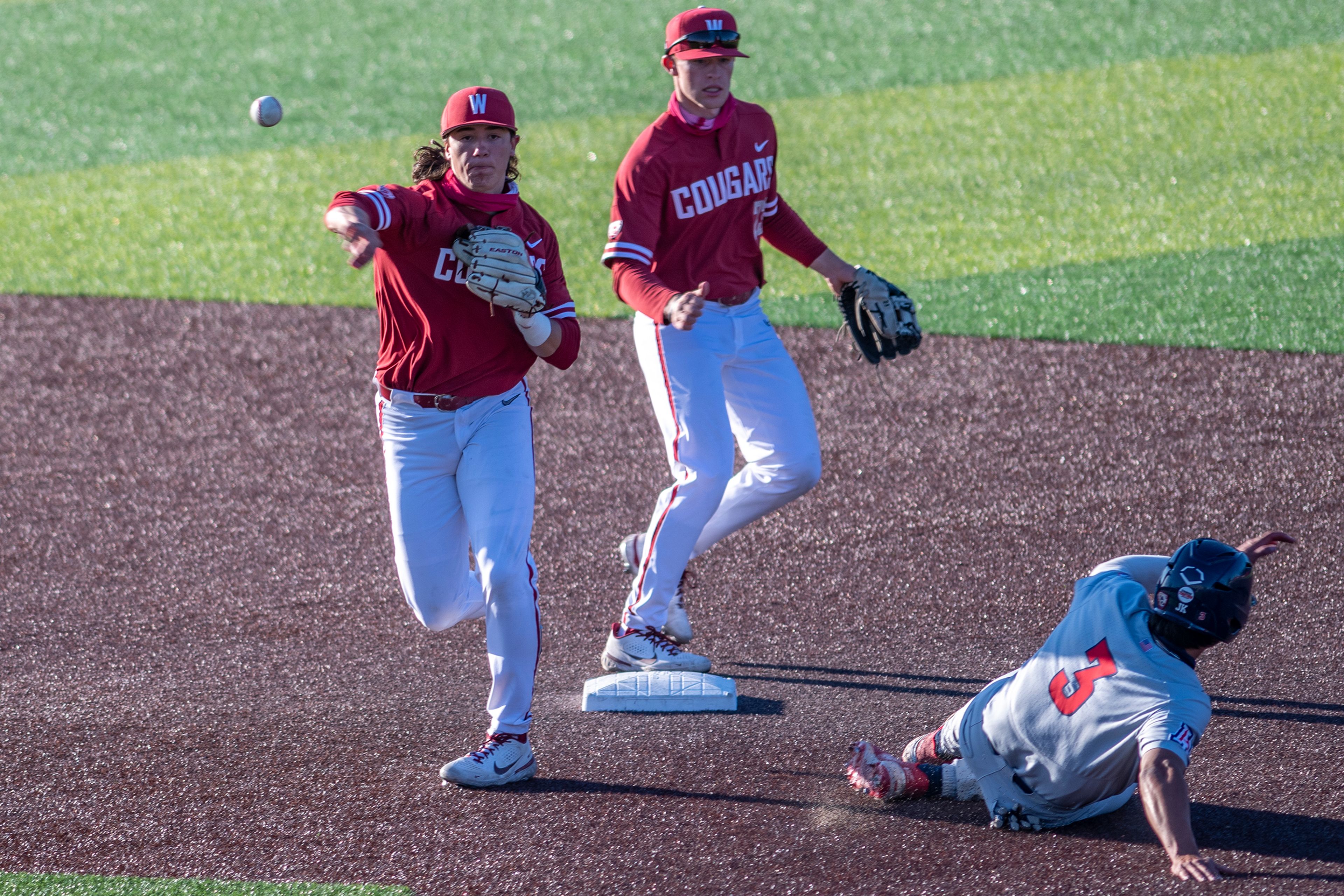 Washington State second baseman Kyle Russell, left, leads the team with a .348 batting average heading into a three-game series starting at 3:05 p.m. today against No. 4 Oregon State.