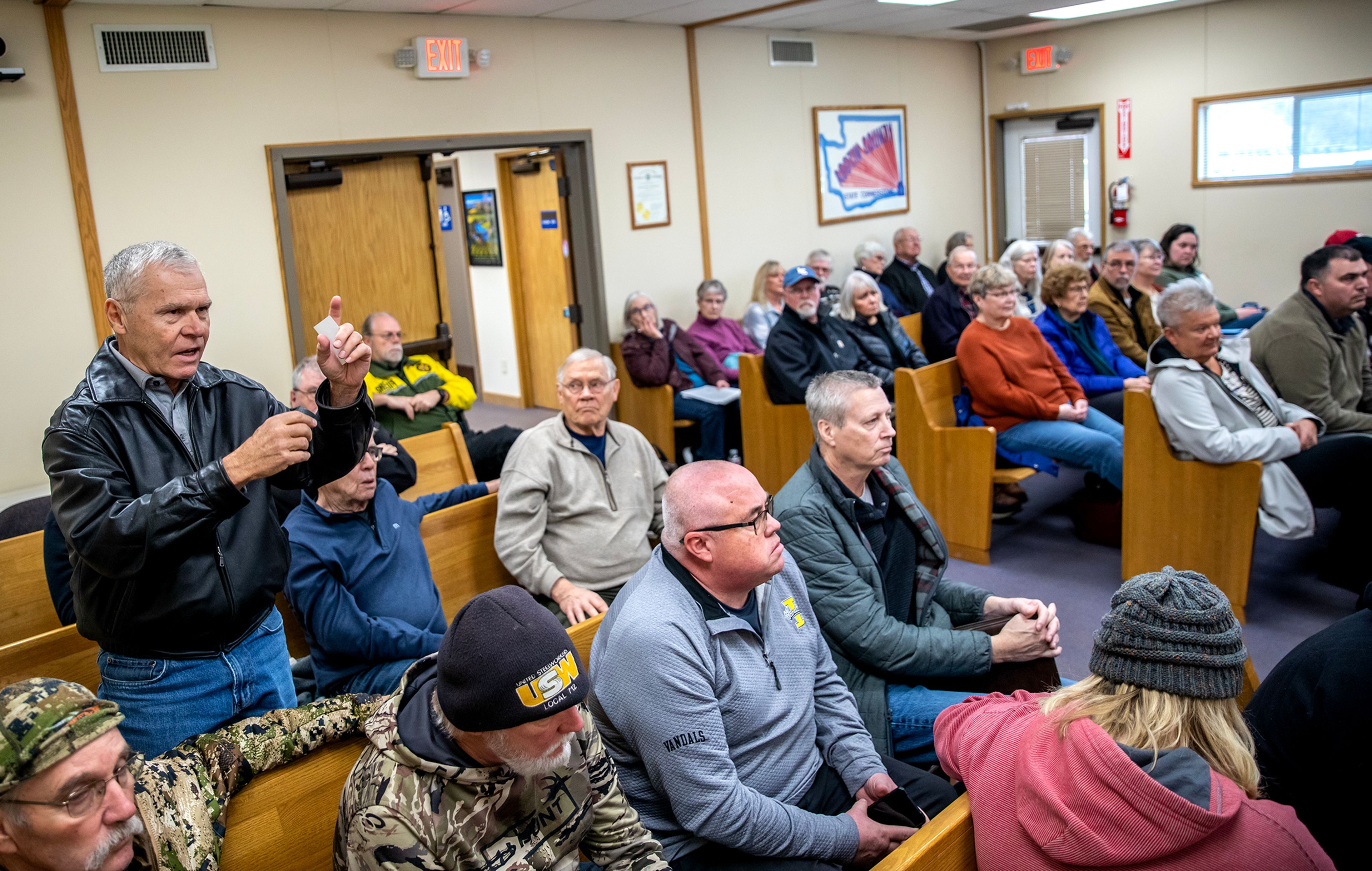 Dean Vahlkamp stands up to address the Asotin County Commissioners about the email the Public Facilities District board of directors received about the funding of the Asotin County Family Aquatics Center Monday in Asotin.