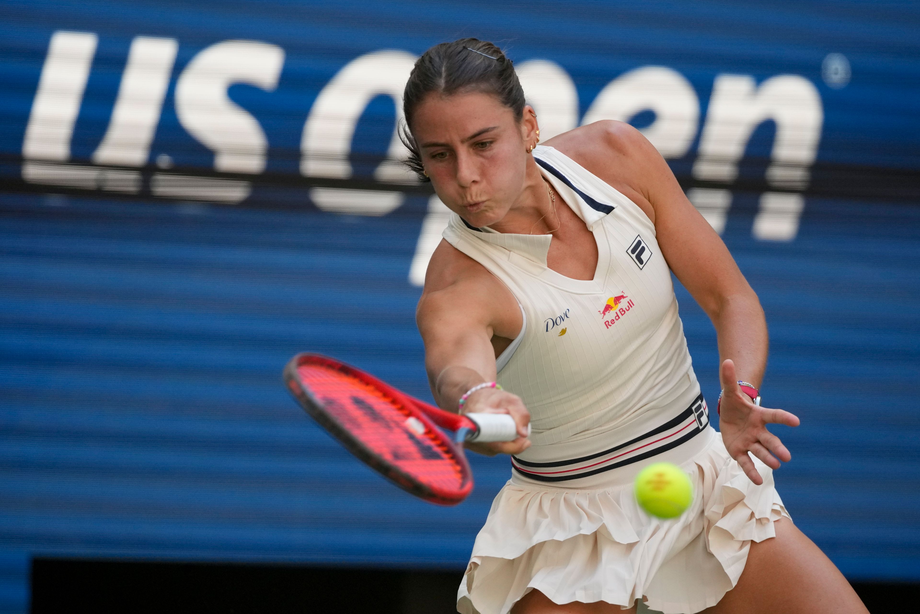 Emma Navarro, of the United States, returns a shot to Paula Badosa, of Spain, during the quarterfinals of the U.S. Open tennis championships, Tuesday, Sept. 3, 2024, in New York.