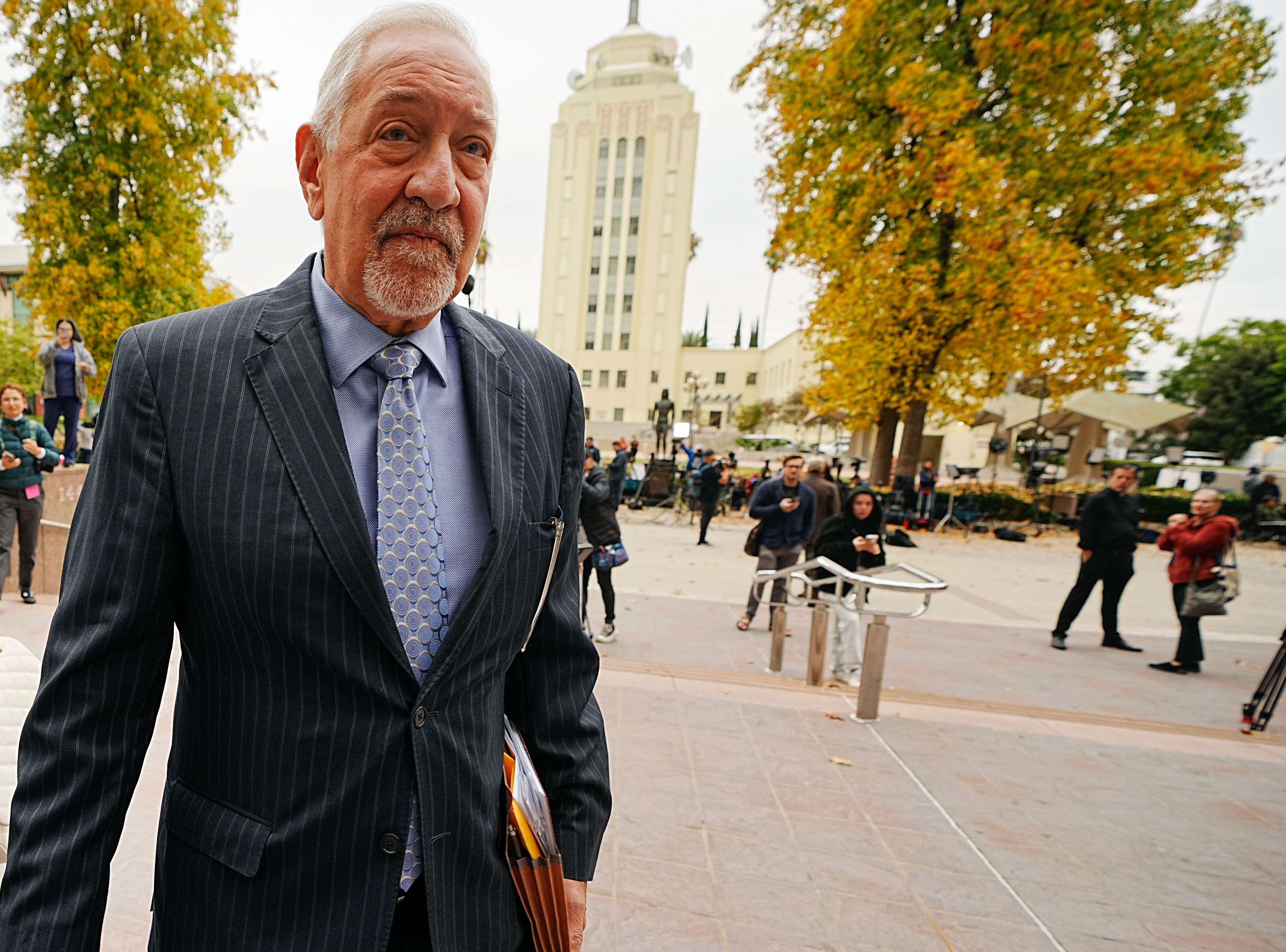 Defense Attorney Mark Geragos, arrives at the Van Nuys courthouse in Los Angeles, for a hearing for Erik and Lyle Menendez, on Monday, Nov. 25, 2024. (AP Photo/Damian Dovarganes)