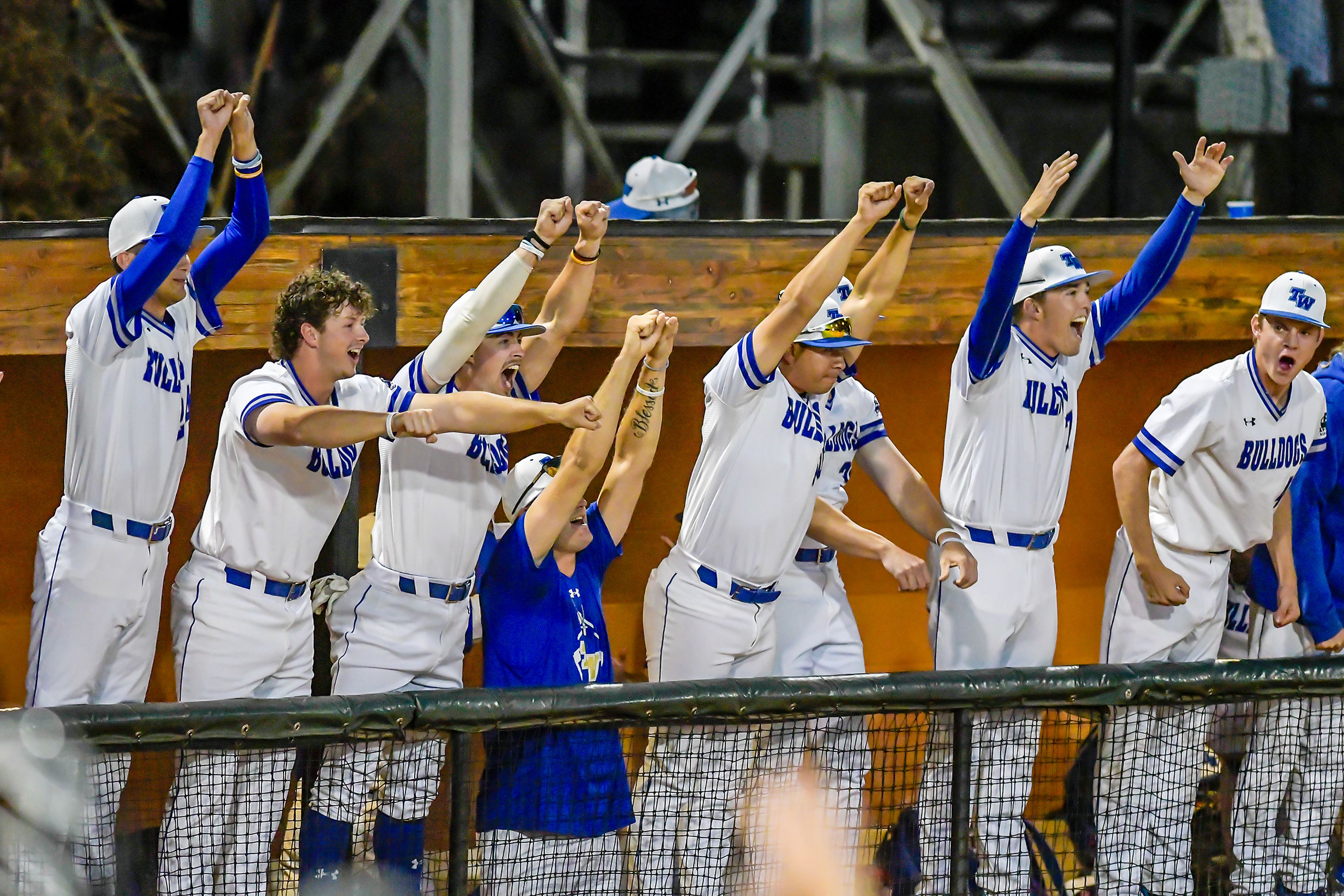 Tennessee Wesleyan celebrates a hit against Georgia Gwinnett in Game 12 of the NAIA World Series at Harris Field Monday in Lewiston.